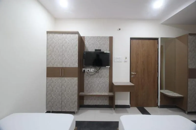 Bed in Arjuna Luxury Rooms