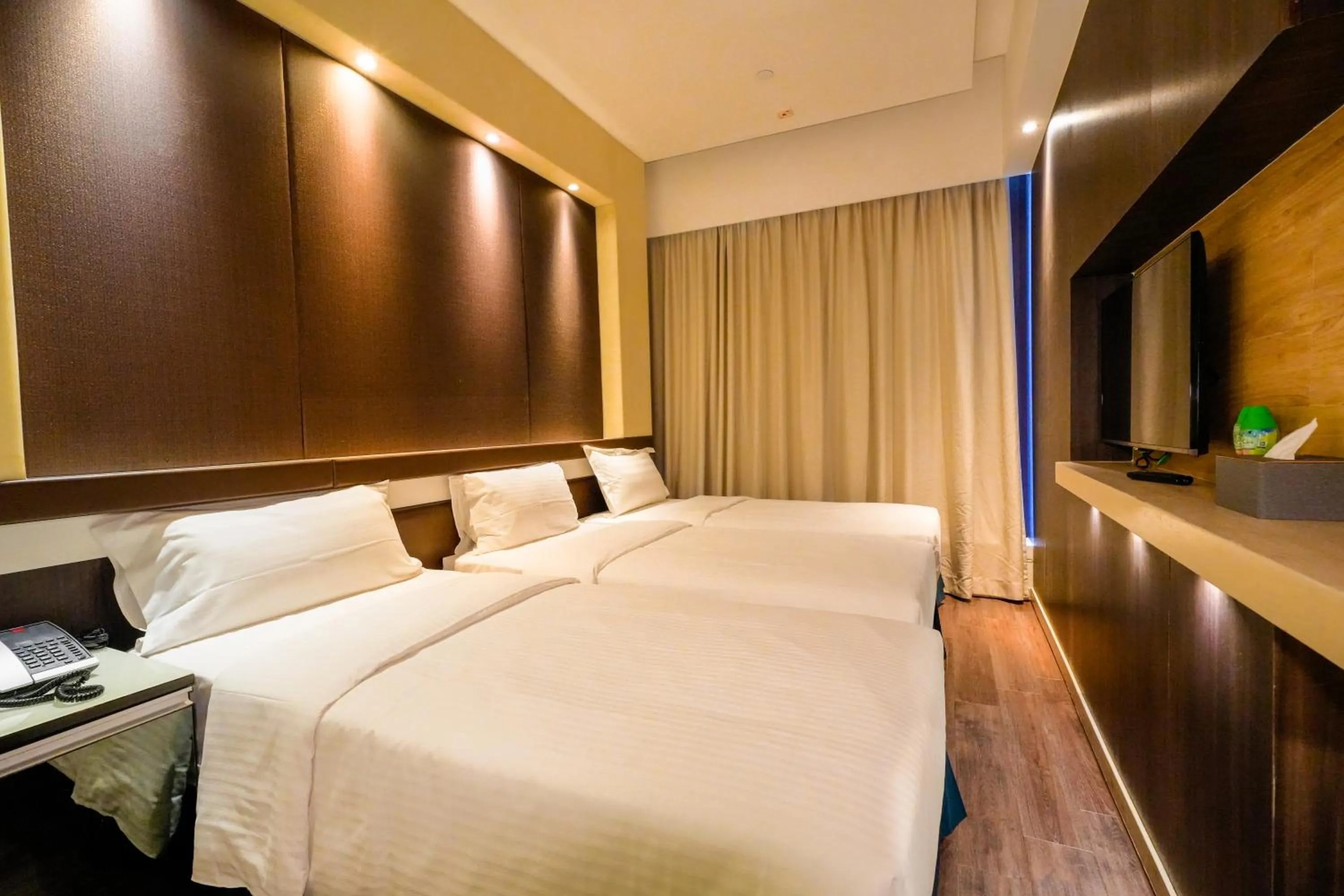 Bed in Epoch Hotel