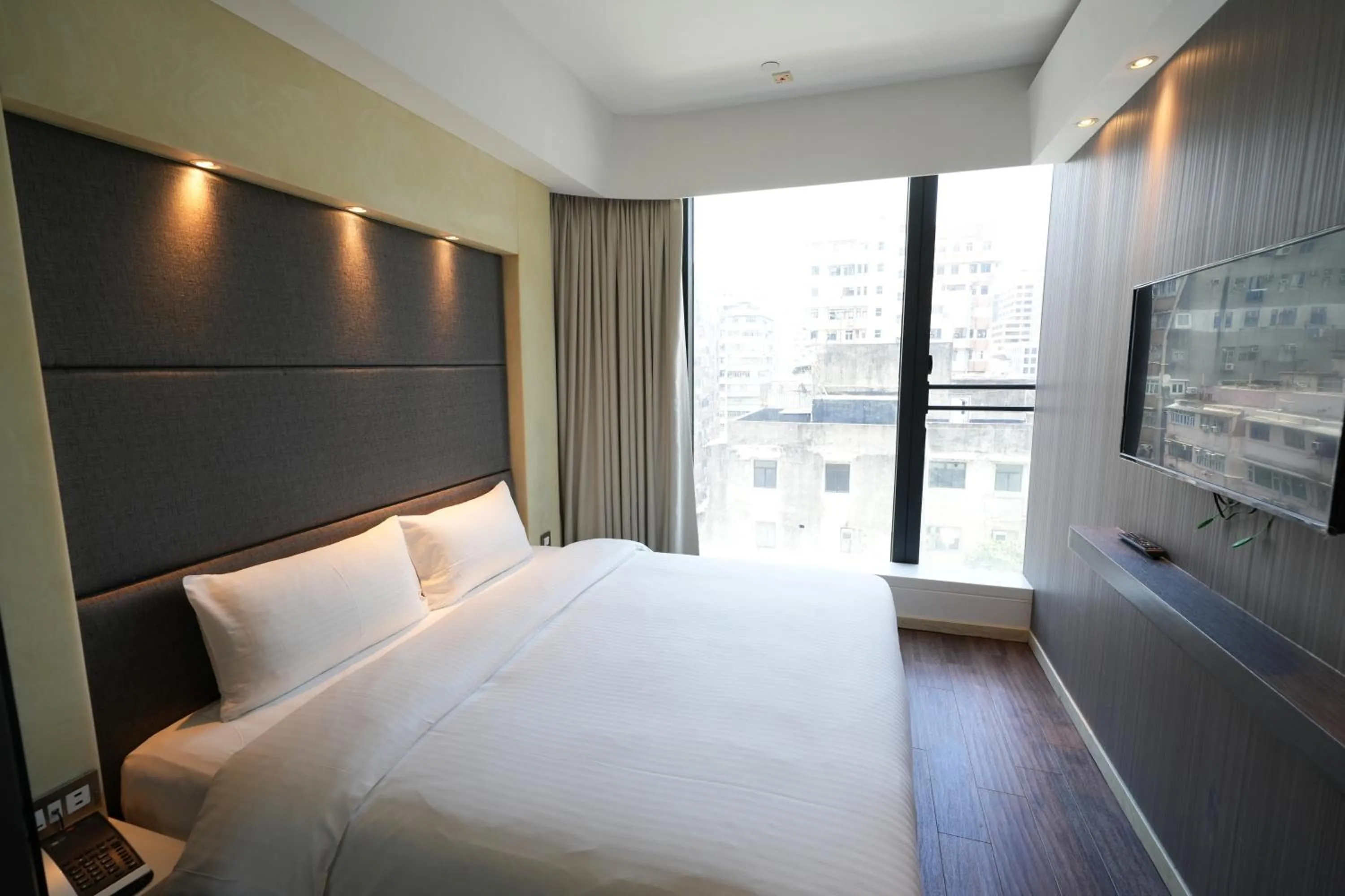 Bed in Epoch Hotel