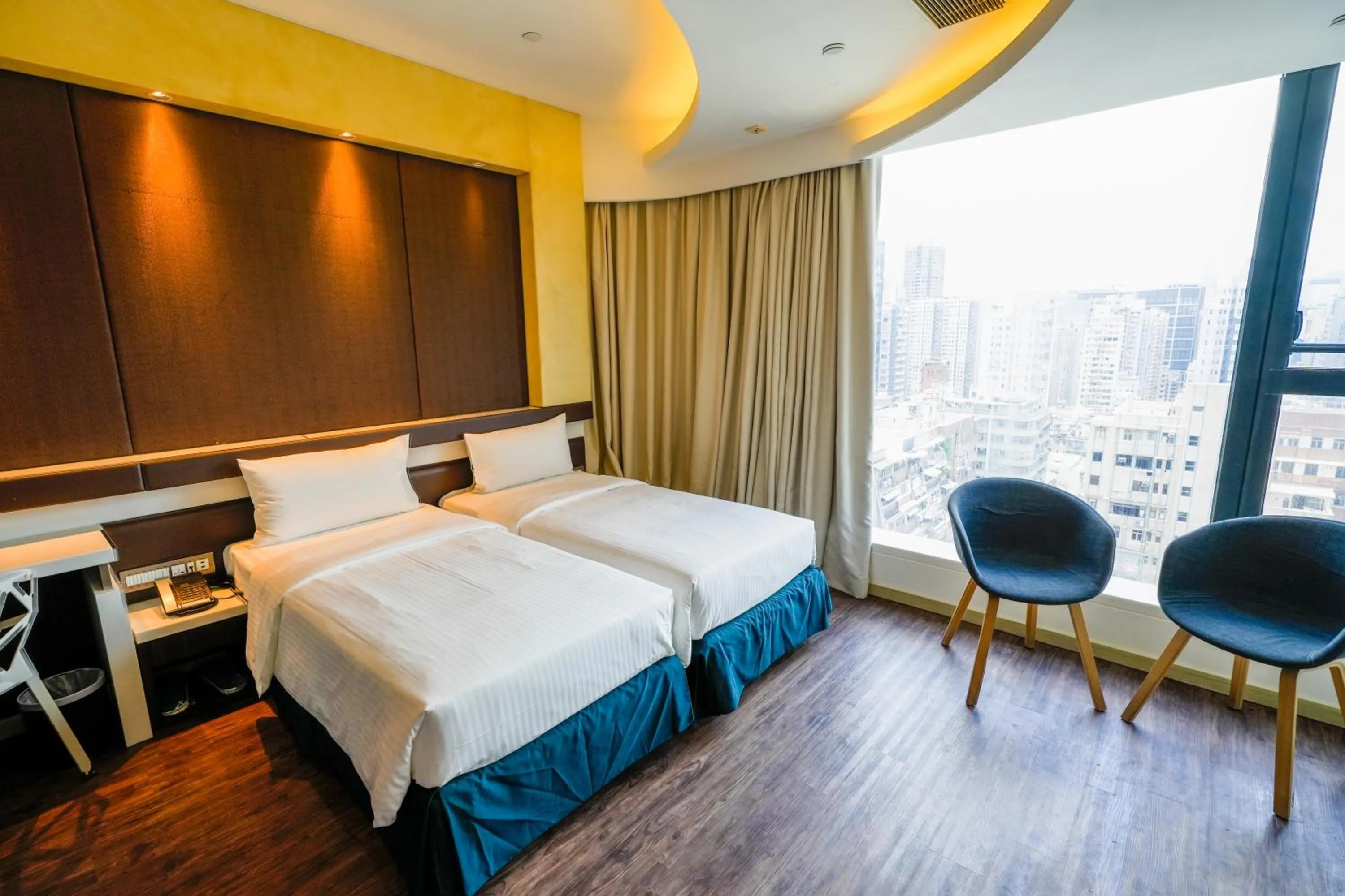 Bed in Epoch Hotel