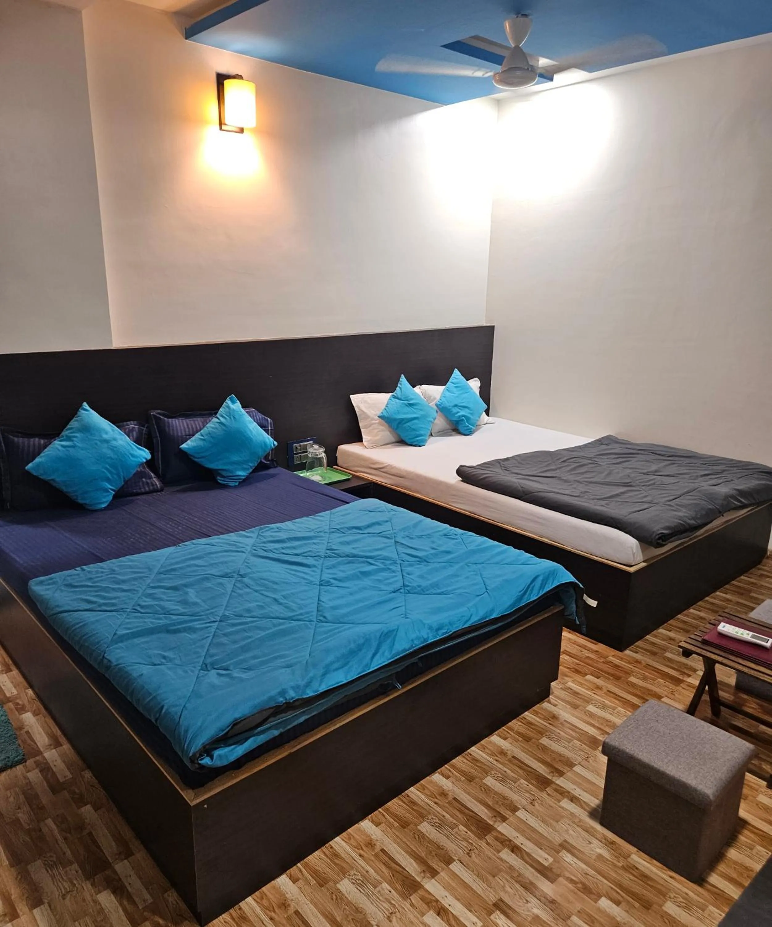 Bed in Hotel Sai Dakshina Inn & The Fern Restaurant