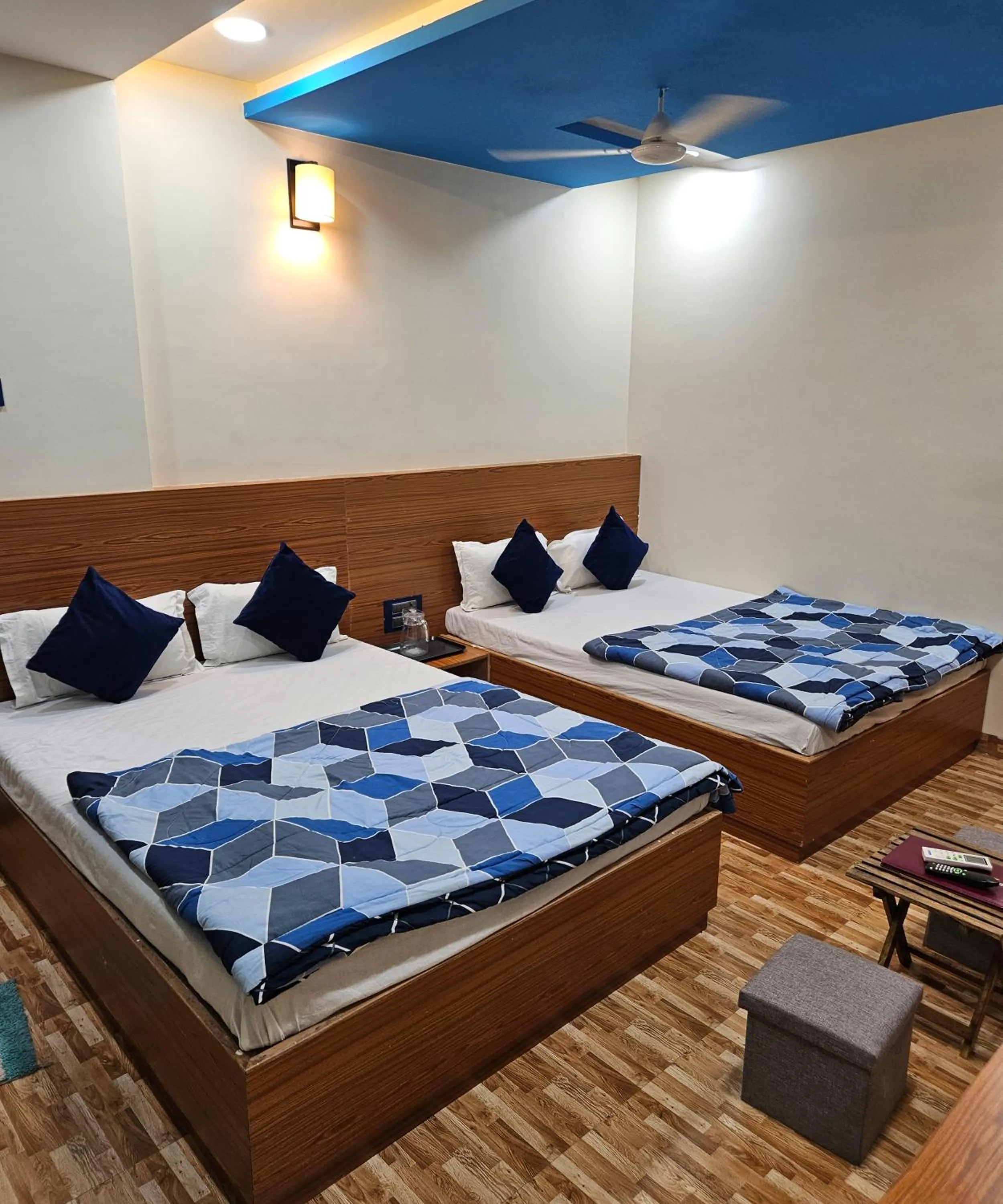 Bed in Hotel Sai Dakshina Inn & The Fern Restaurant