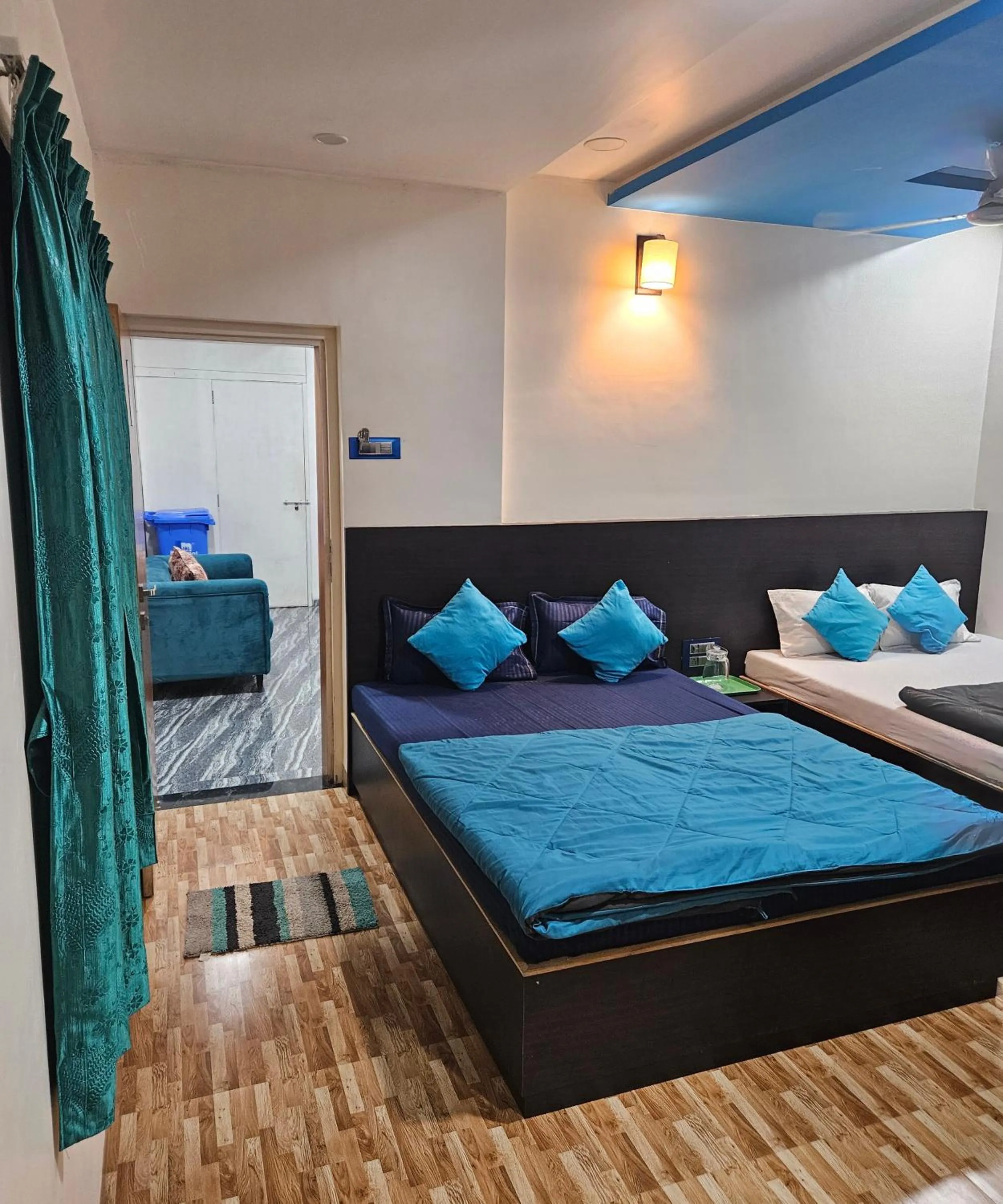 Bed in Hotel Sai Dakshina Inn & The Fern Restaurant