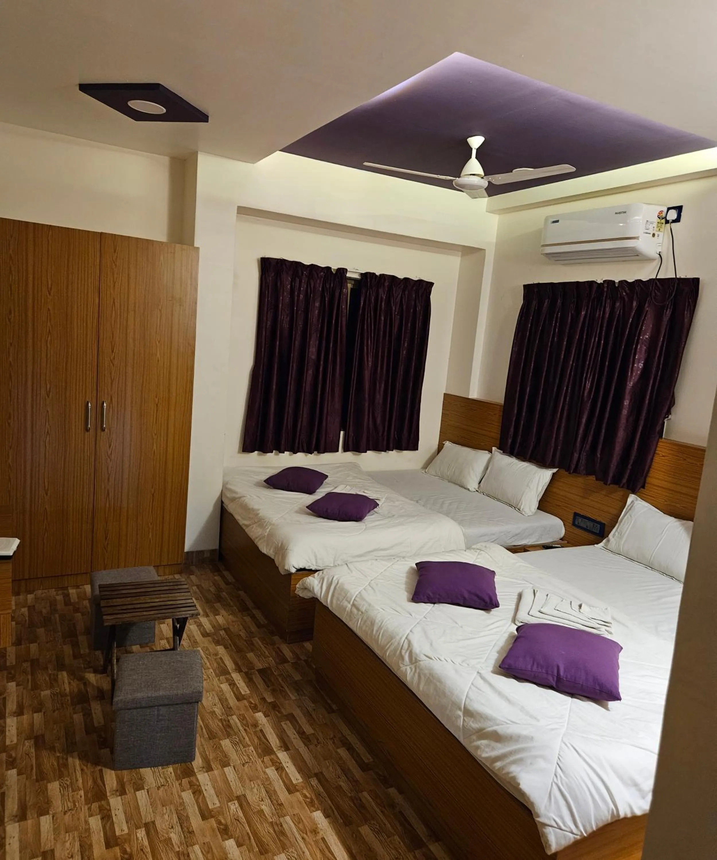 Bed in Hotel Sai Dakshina Inn & The Fern Restaurant