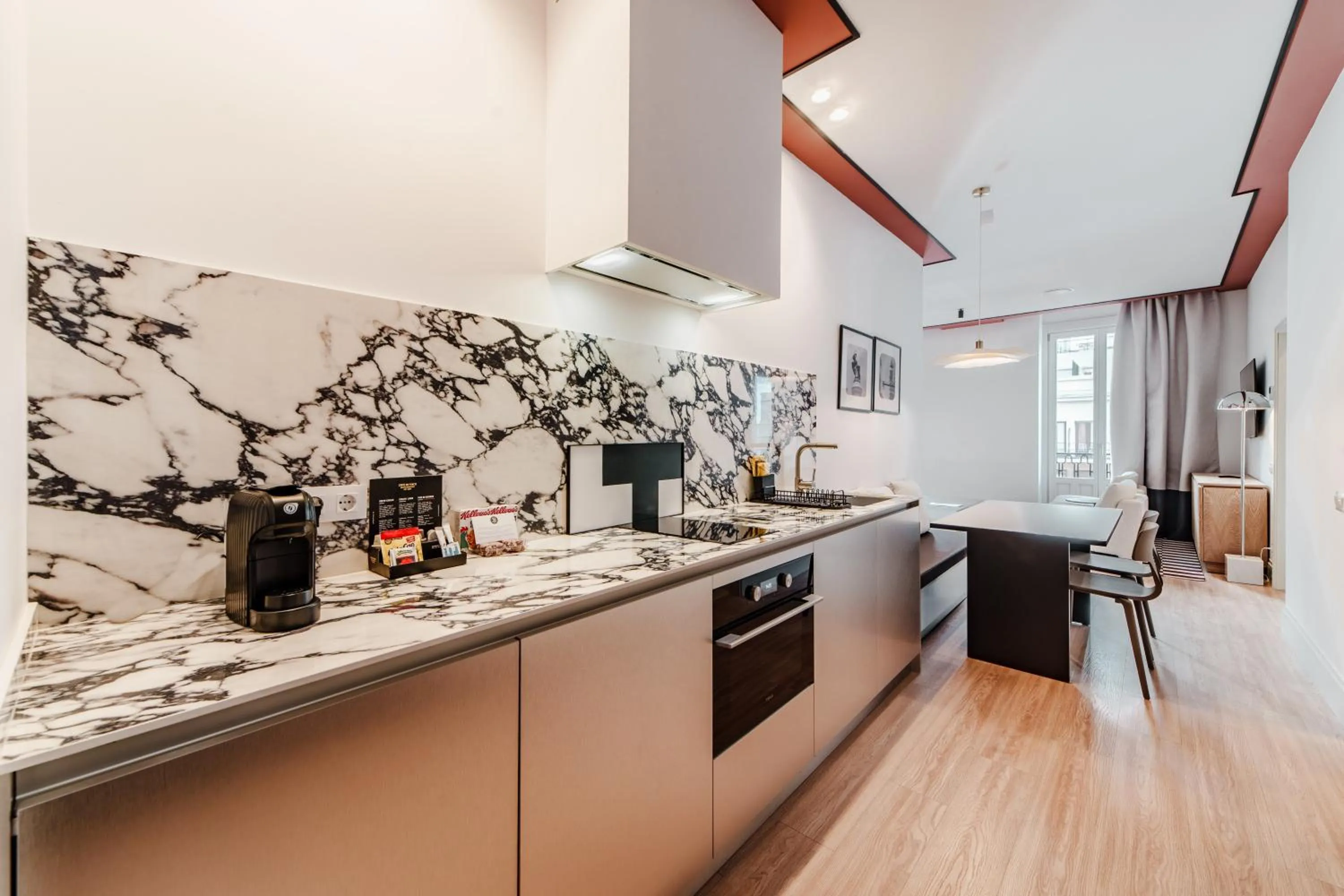 Kitchen or kitchenette in Apartamentos Soho Boutique Hoy No Me Puedo Levantar