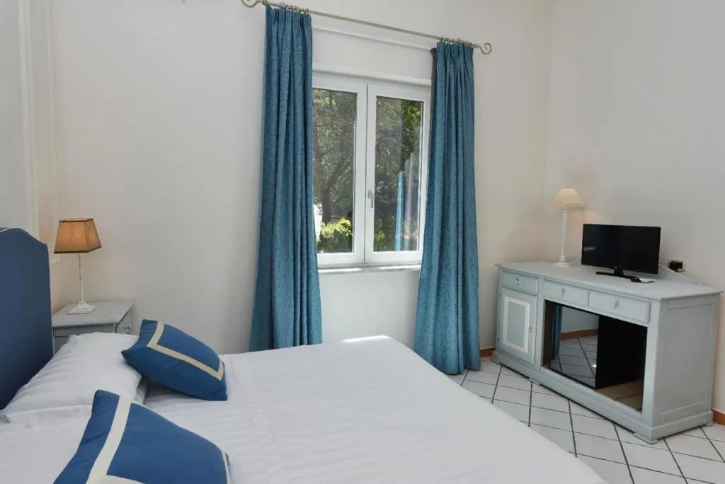 Bed in Hotel Garden Riviera