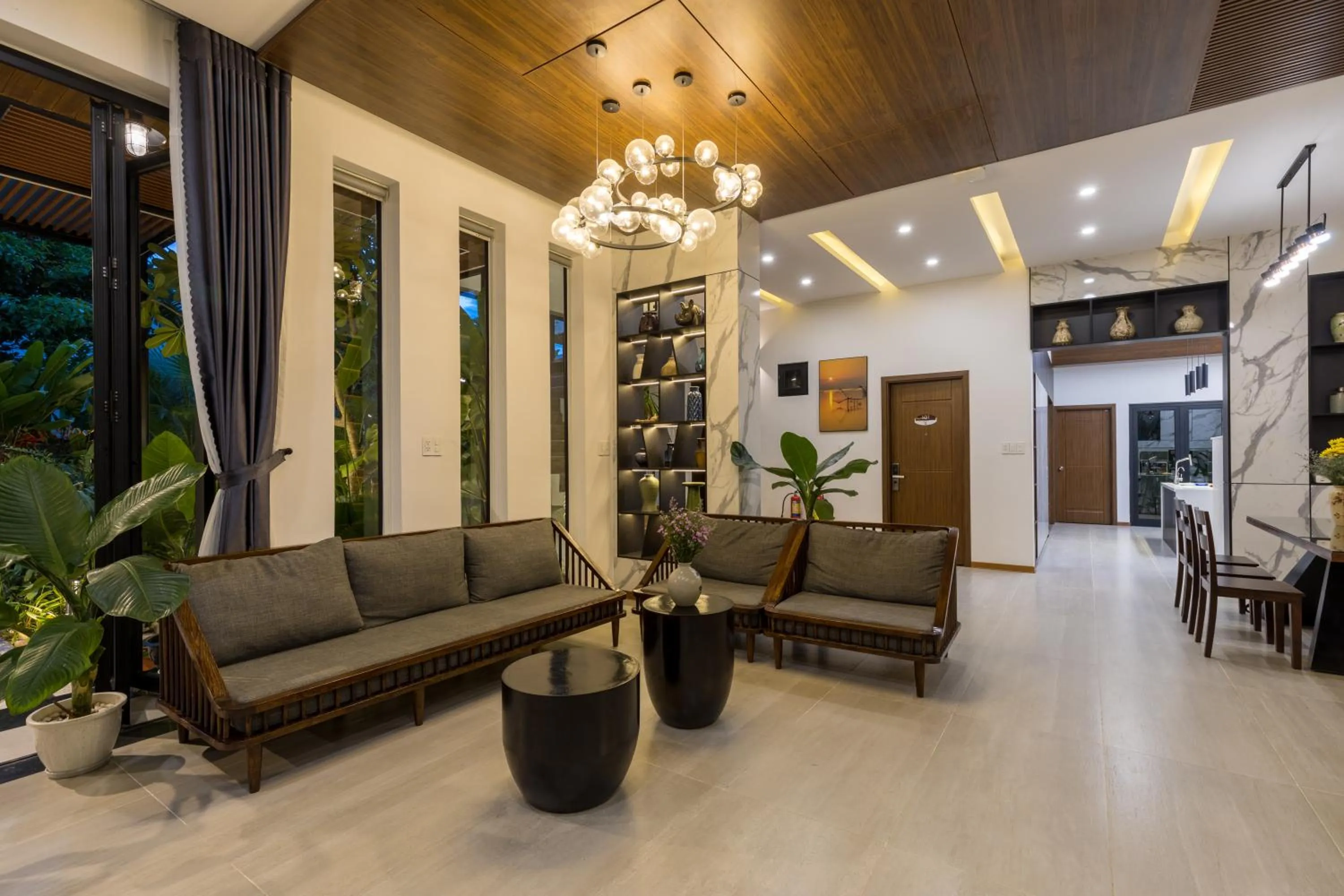 Communal lounge/ TV room in Charm Champion Villa Hoian