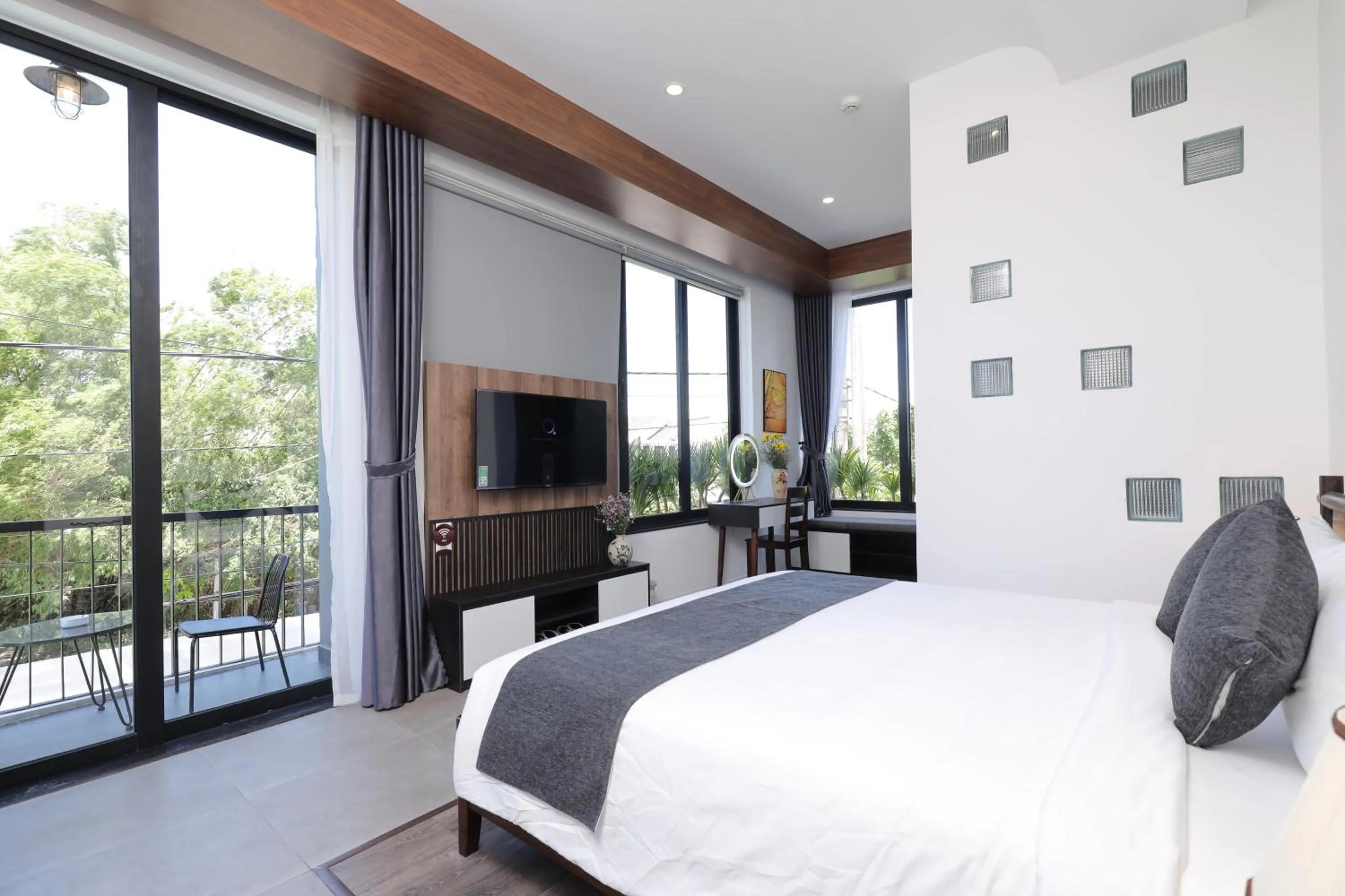 Bed in Charm Champion Villa Hoian