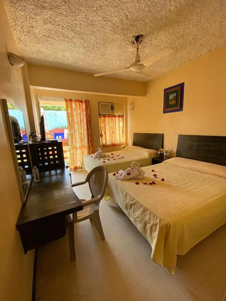 Bed in Hotel Zihuatanejo Centro