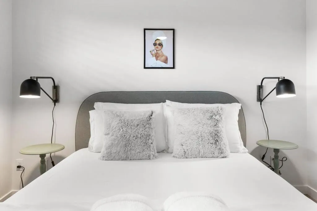 Bed in Contemporary Condo in Central Biltmore