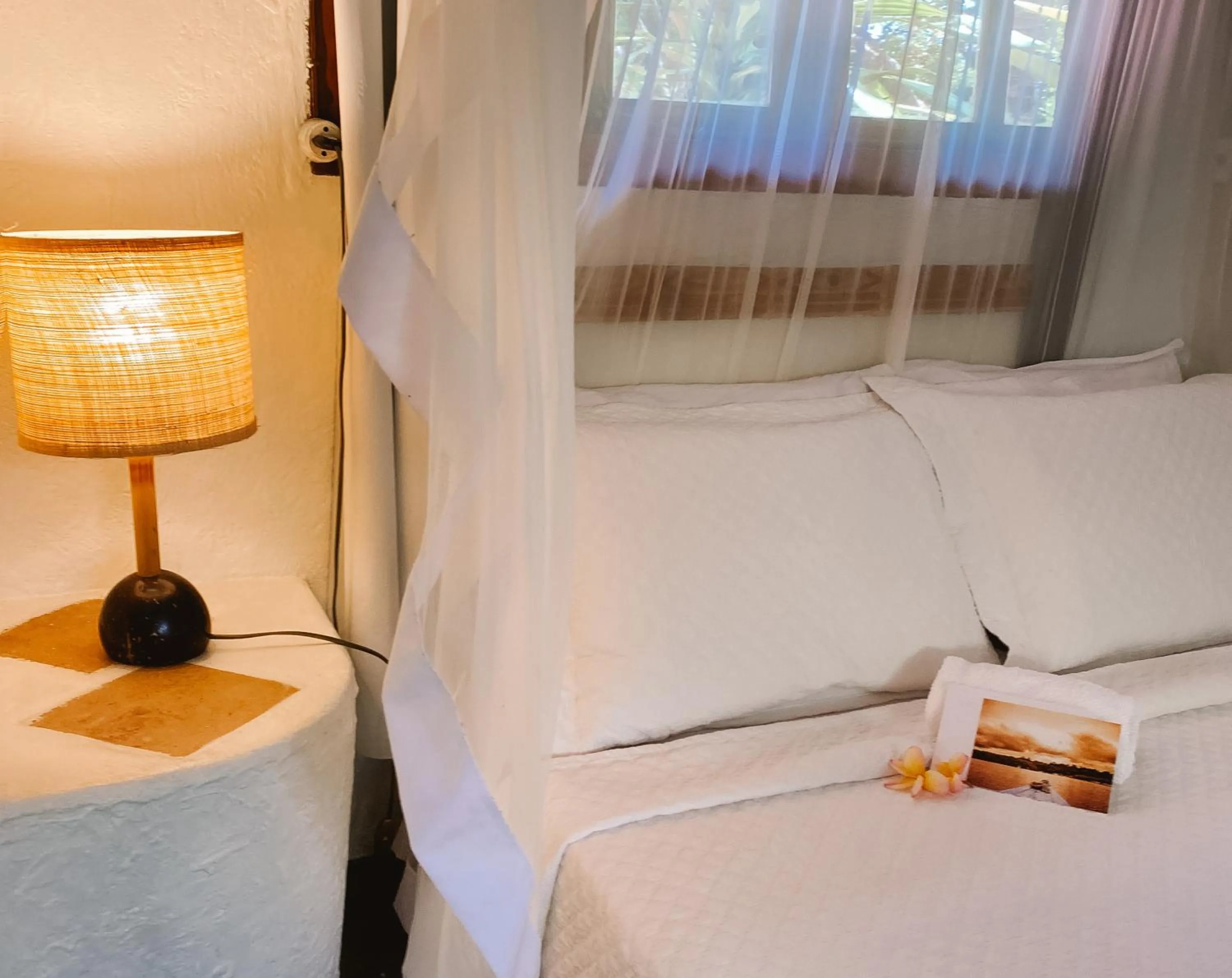 Bed in Bangalôs da Aldeia Caraiva