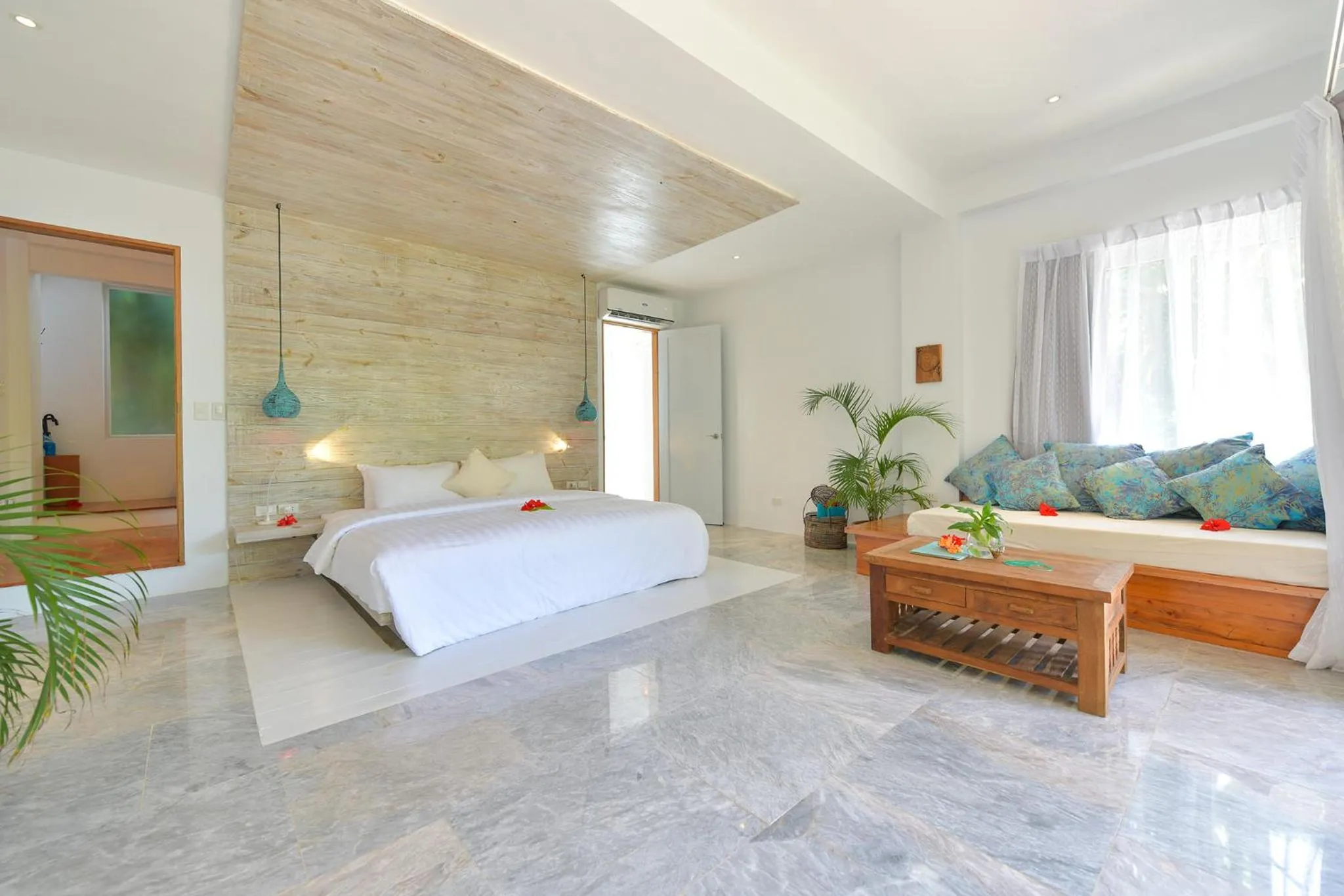 Seating area, Bed in Diniview Villa Resort