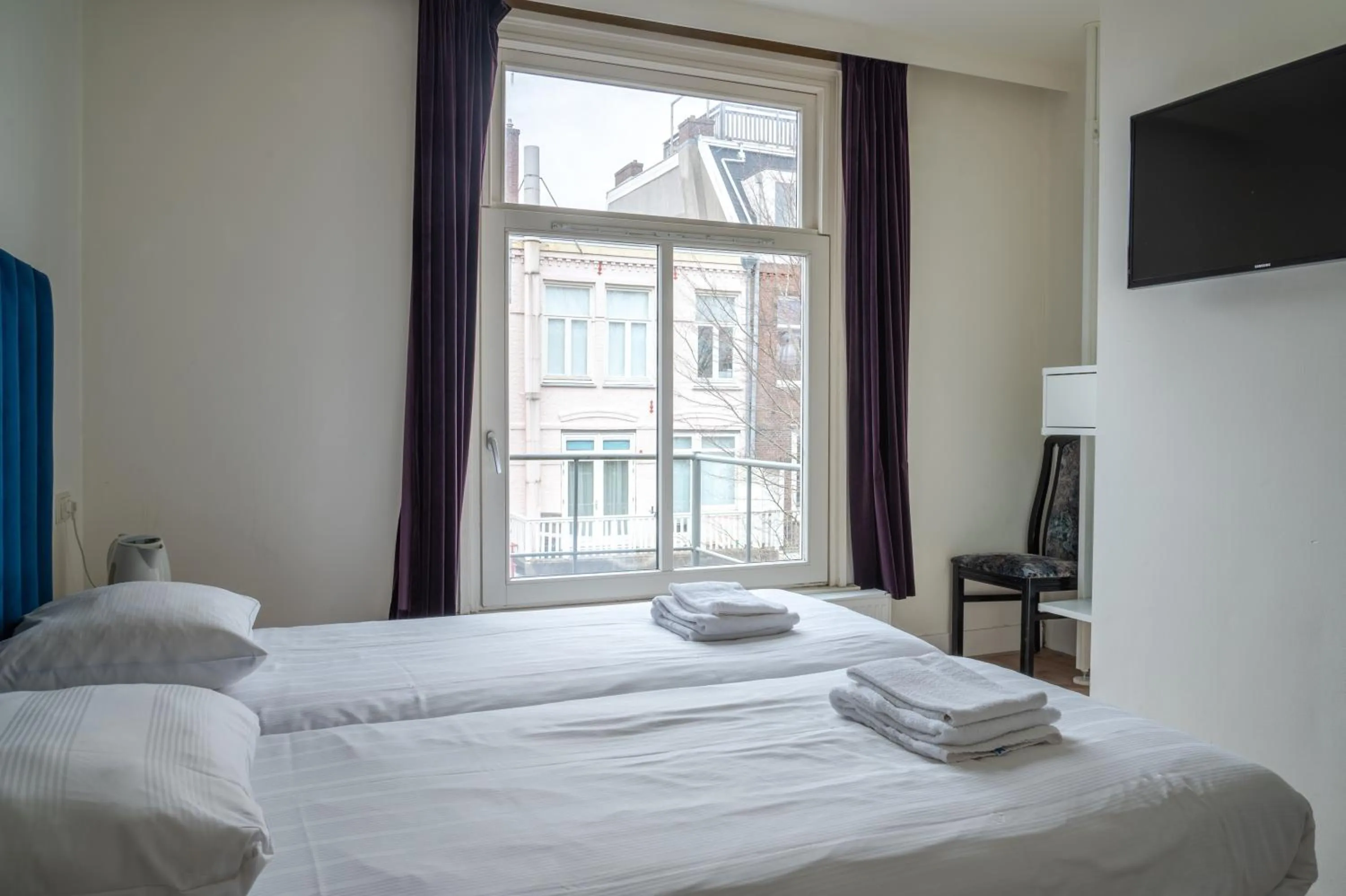 Bed in Hotel Kap City Centre