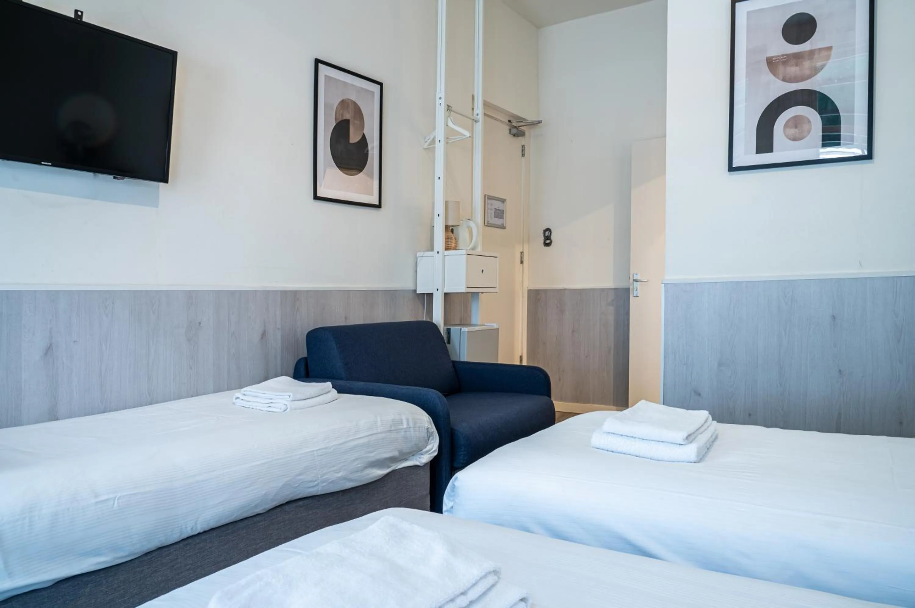 Bed in Hotel Kap City Centre