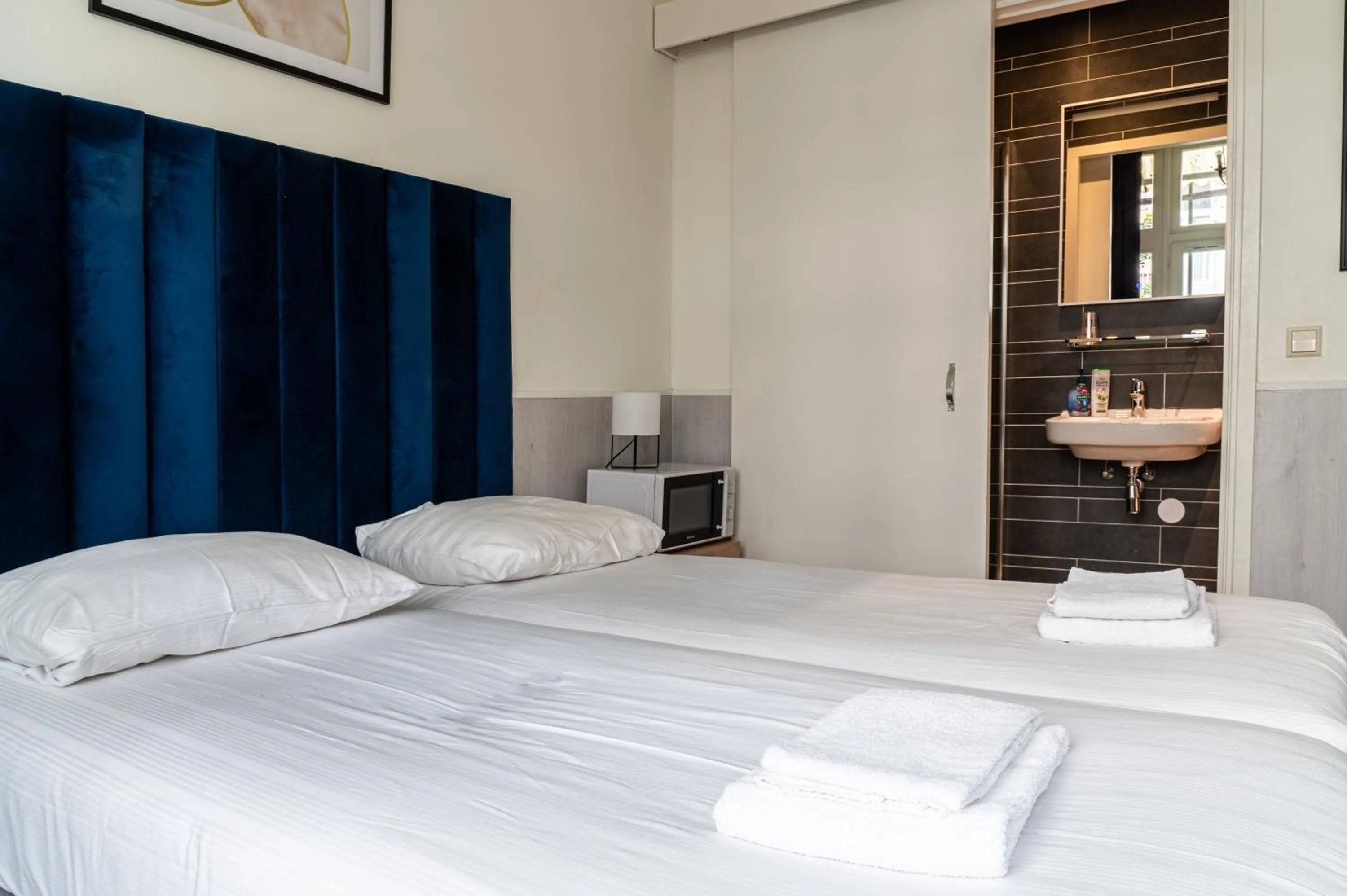 Bed in Hotel Kap City Centre