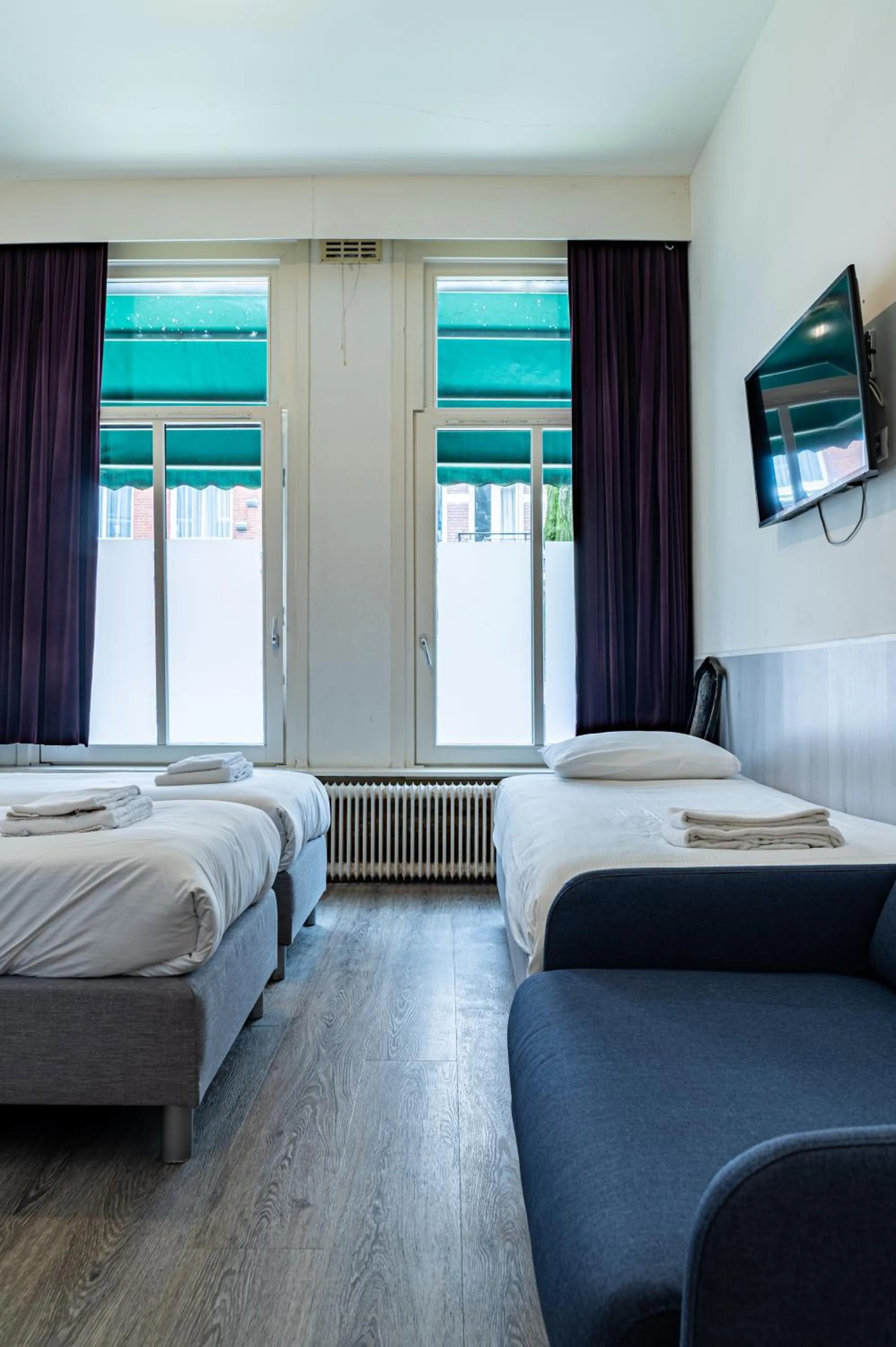 Bed in Hotel Kap City Centre