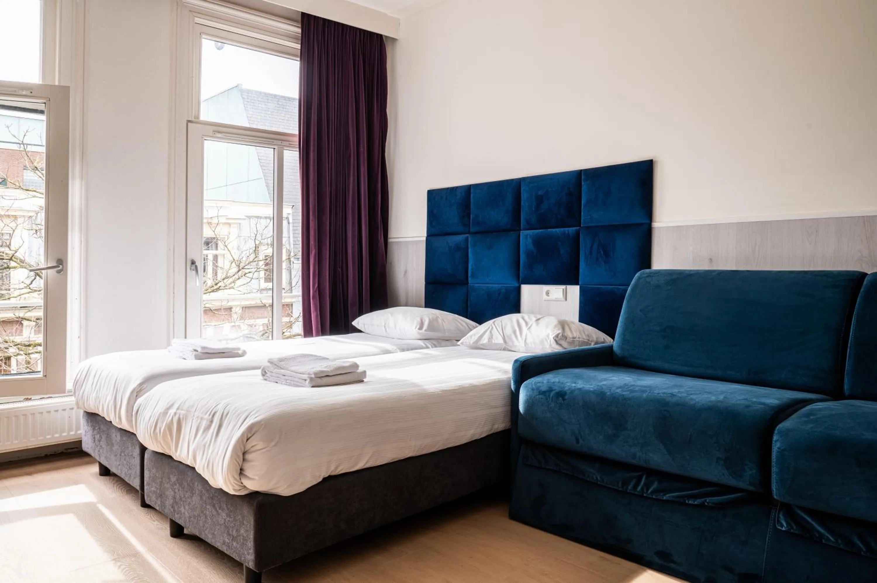 Bed in Hotel Kap City Centre