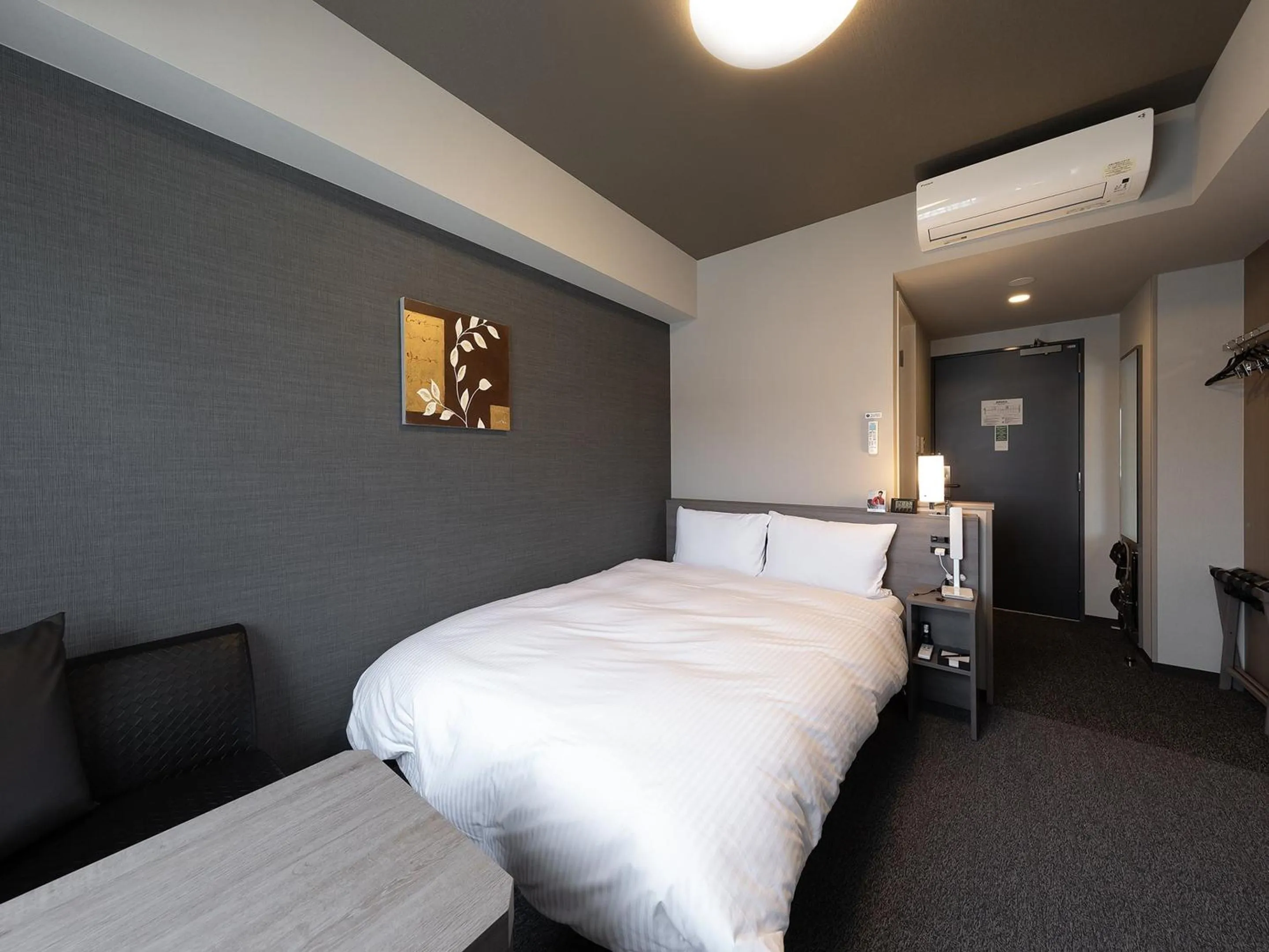 Photo of the whole room, Bed in Hotel Route Inn Kyoto Kameoka Ekimae