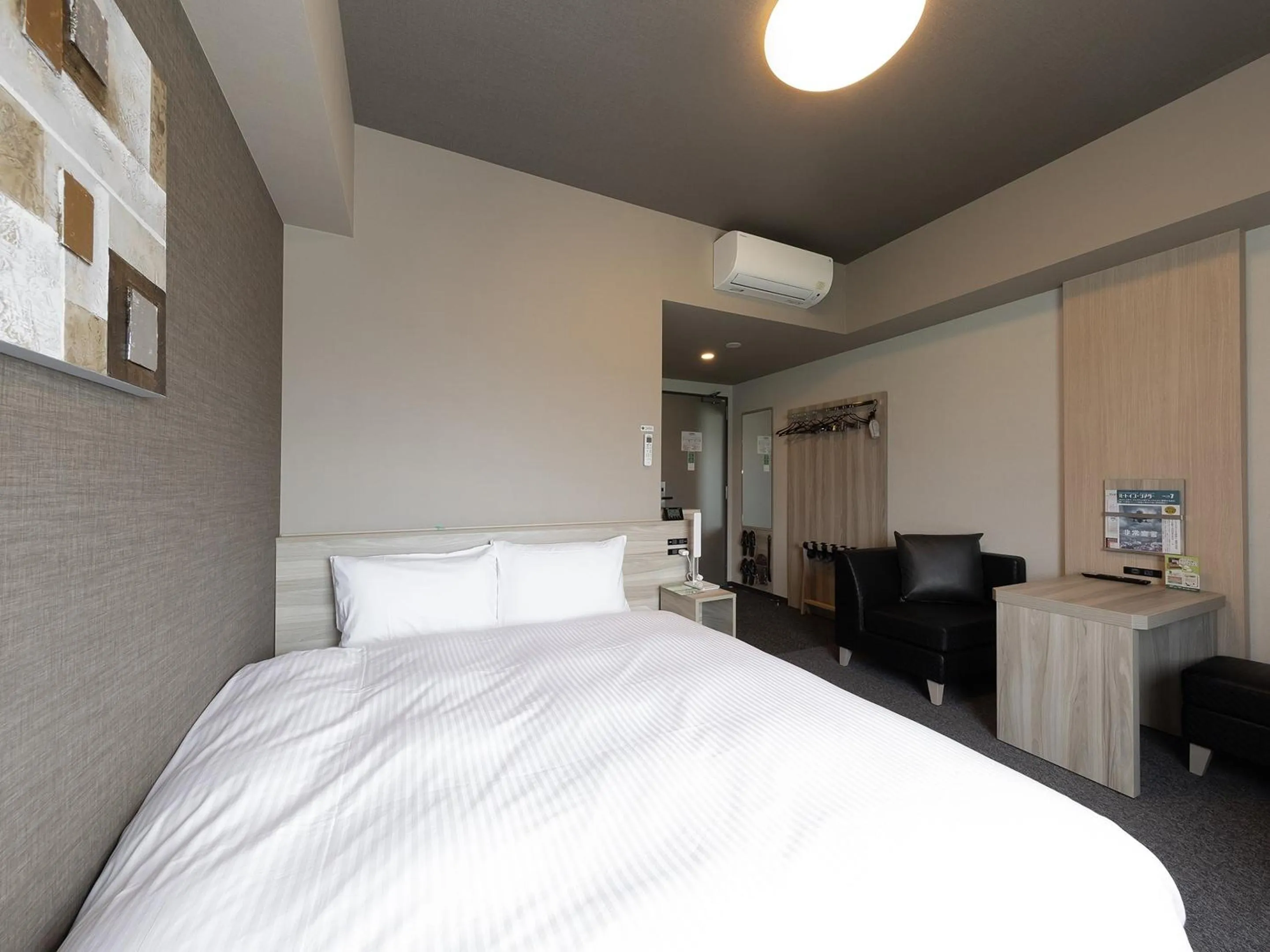 Photo of the whole room, Bed in Hotel Route Inn Kyoto Kameoka Ekimae