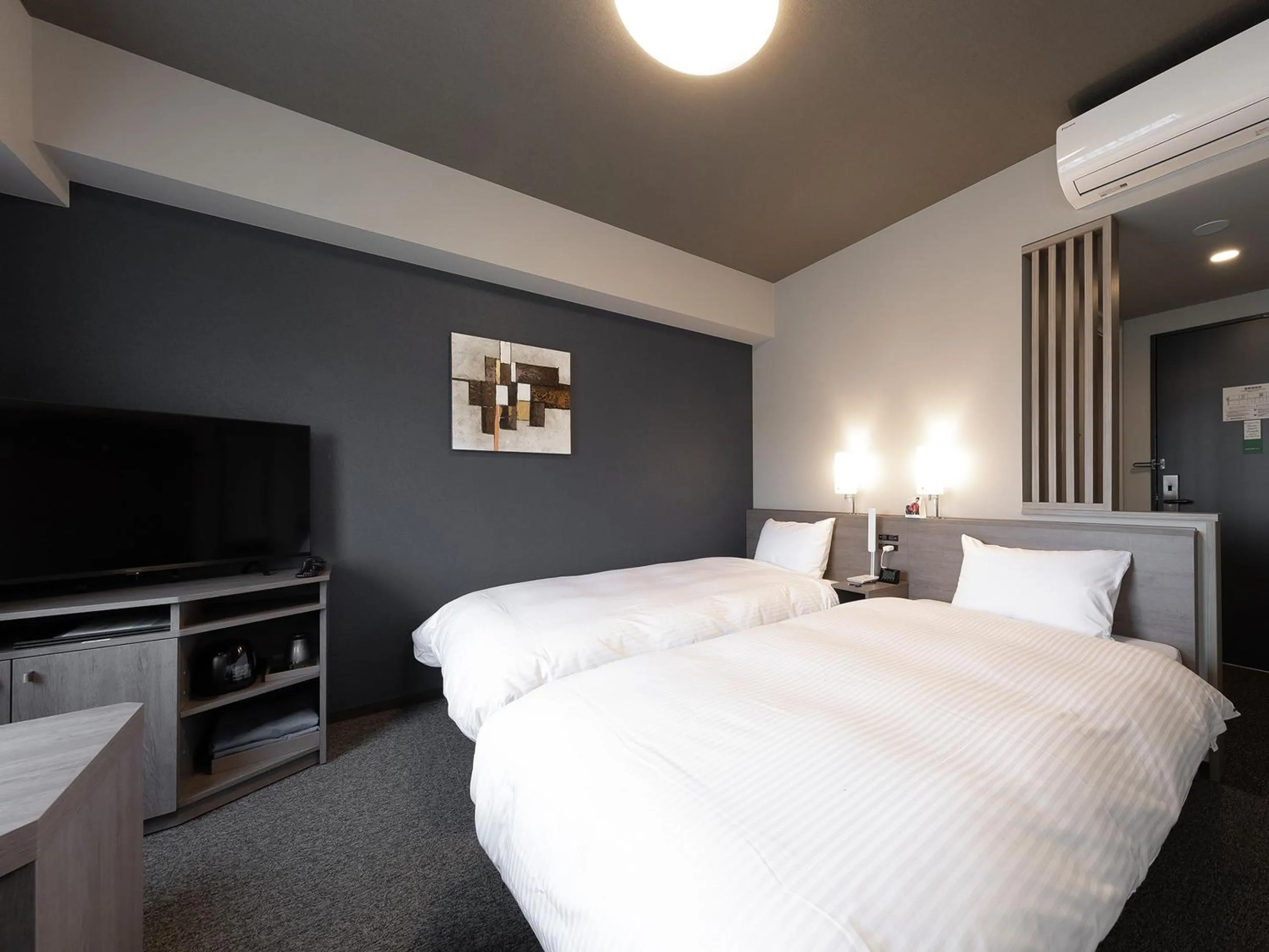 Photo of the whole room, Bed in Hotel Route Inn Kyoto Kameoka Ekimae