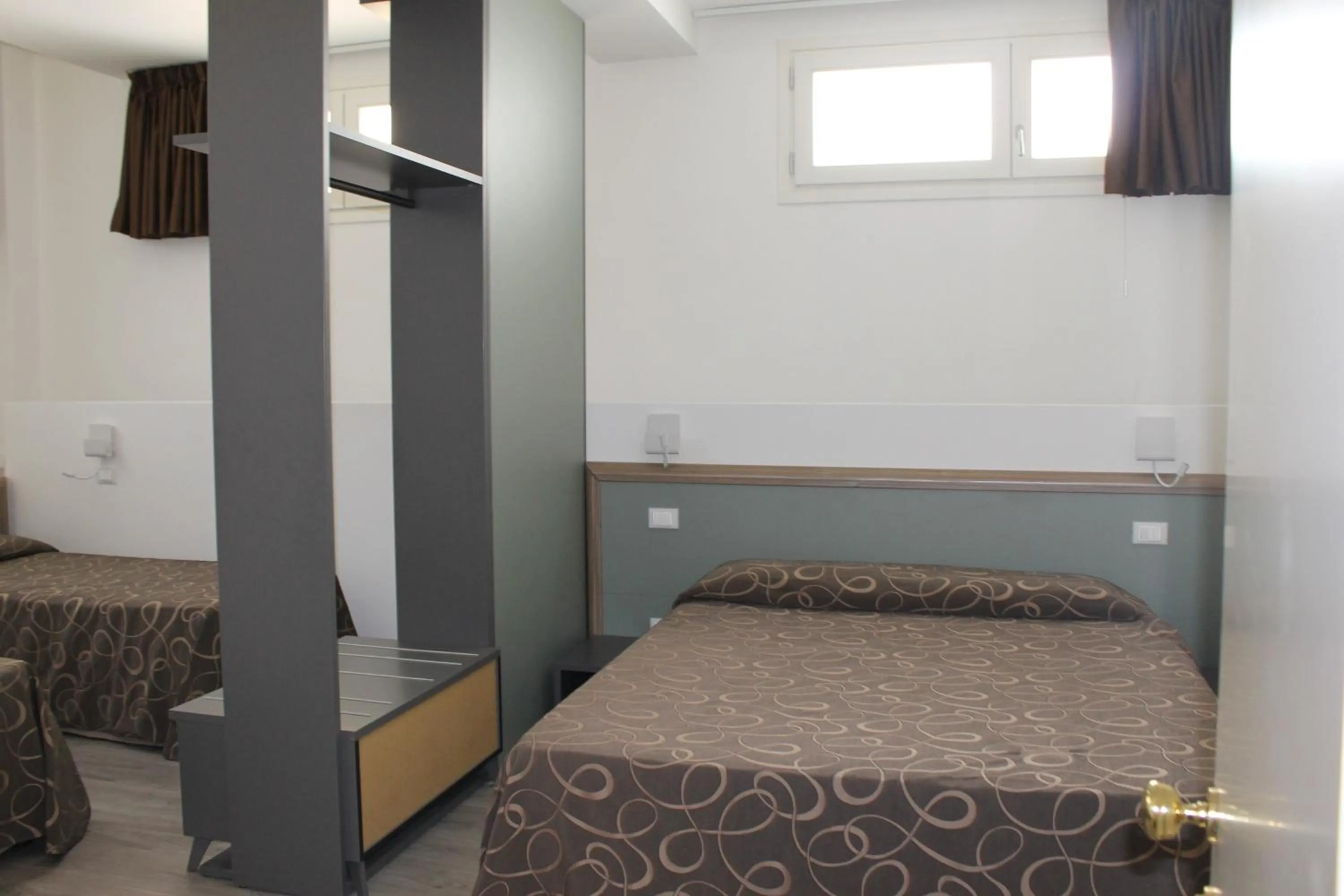 Bed in Hotel Galileo