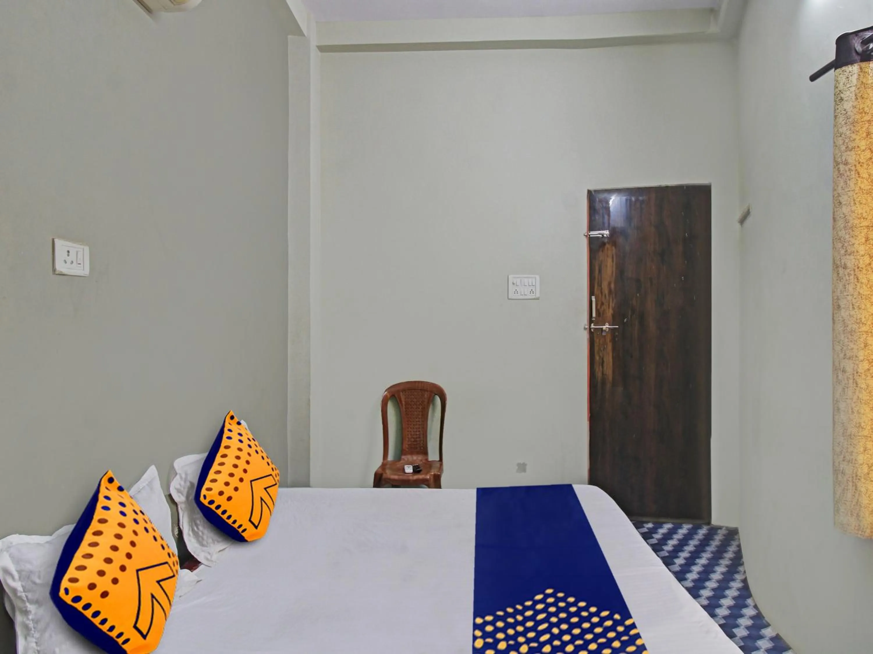 Bedroom in Hotel O G.K Lodging and Guest House