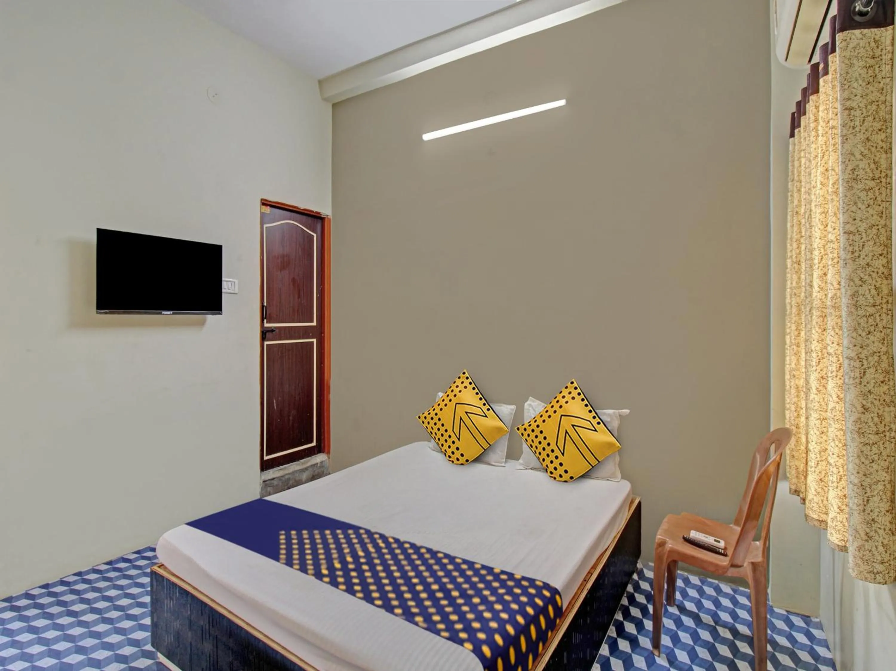 Bedroom in Hotel O G.K Lodging and Guest House