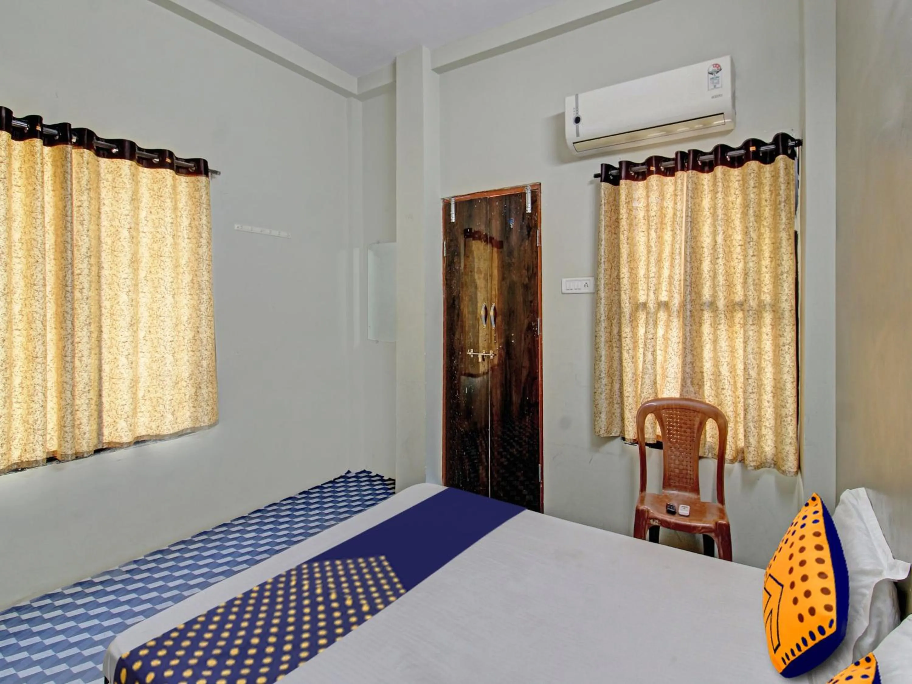 Bedroom in Hotel O G.K Lodging and Guest House
