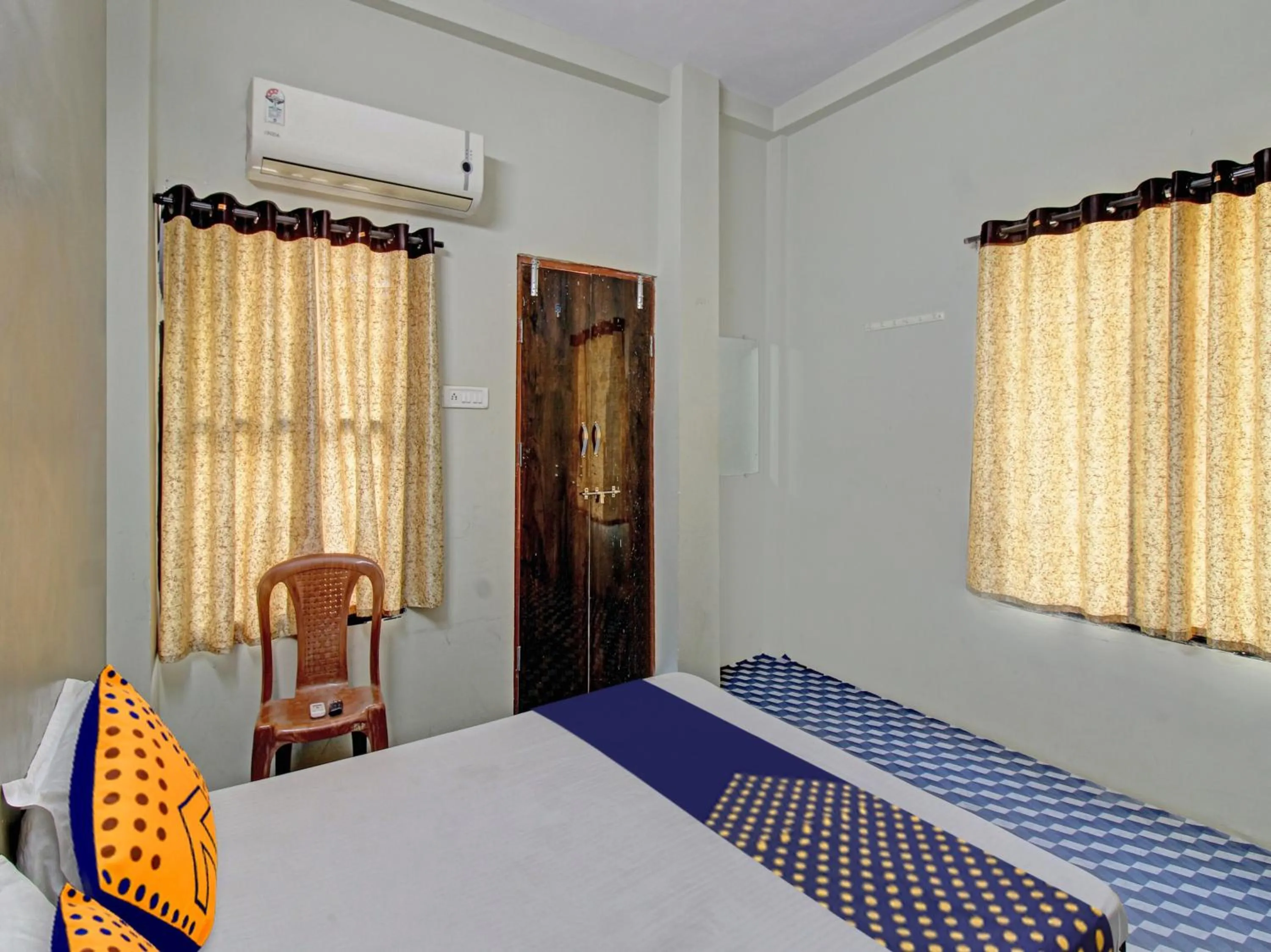 Bedroom in Hotel O G.K Lodging and Guest House