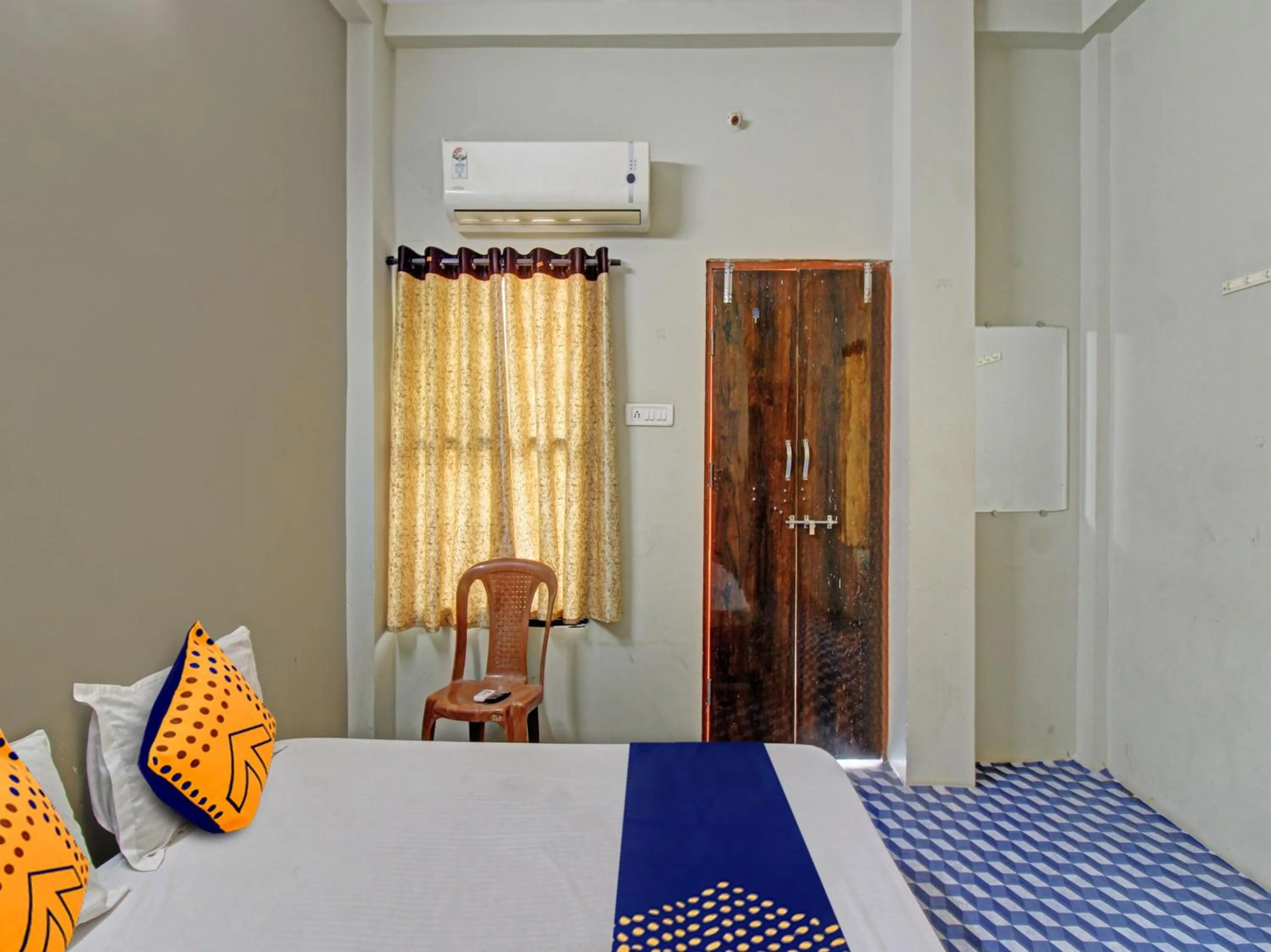 Bedroom in Hotel O G.K Lodging and Guest House