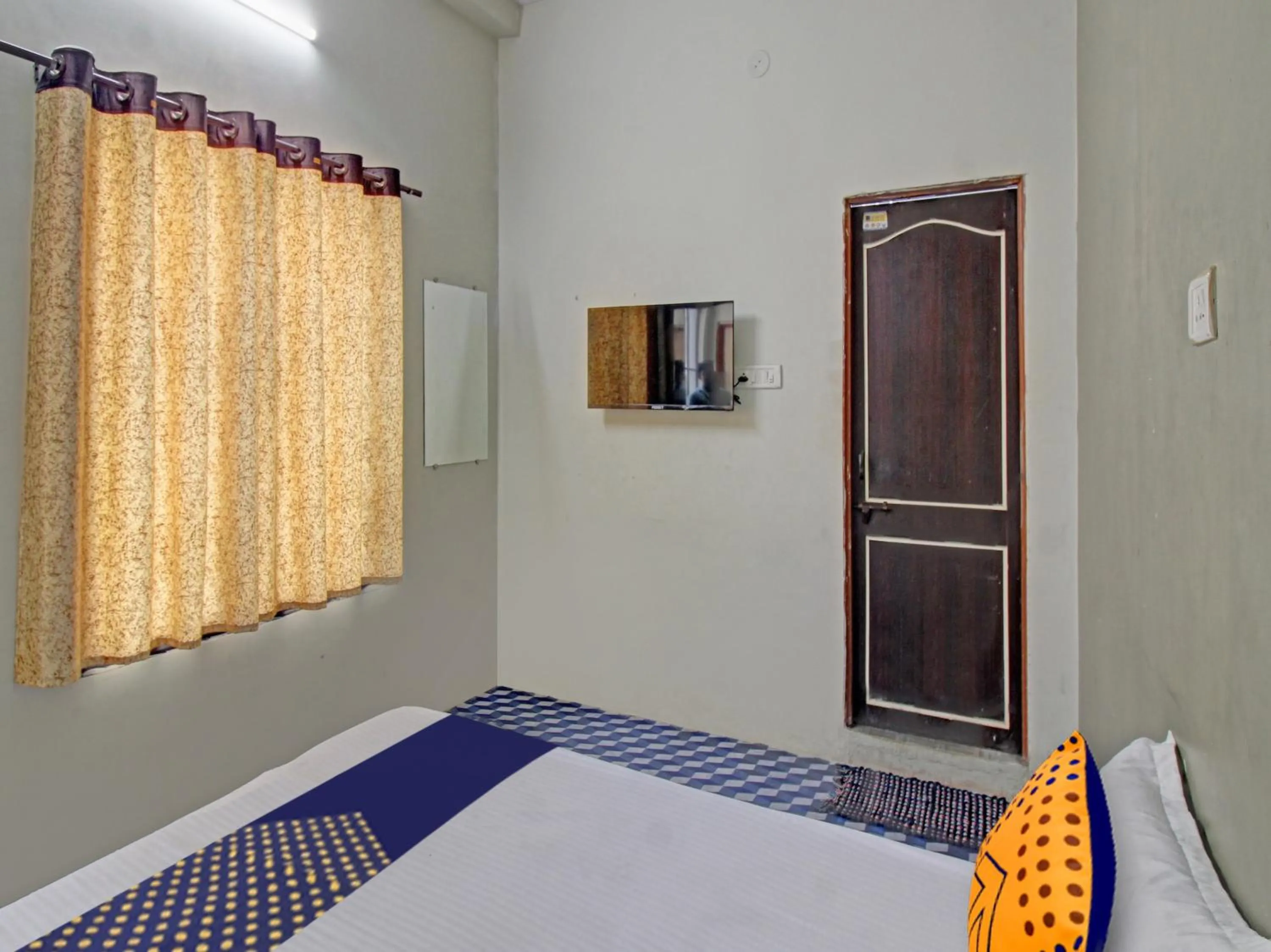 Bedroom in Hotel O G.K Lodging and Guest House