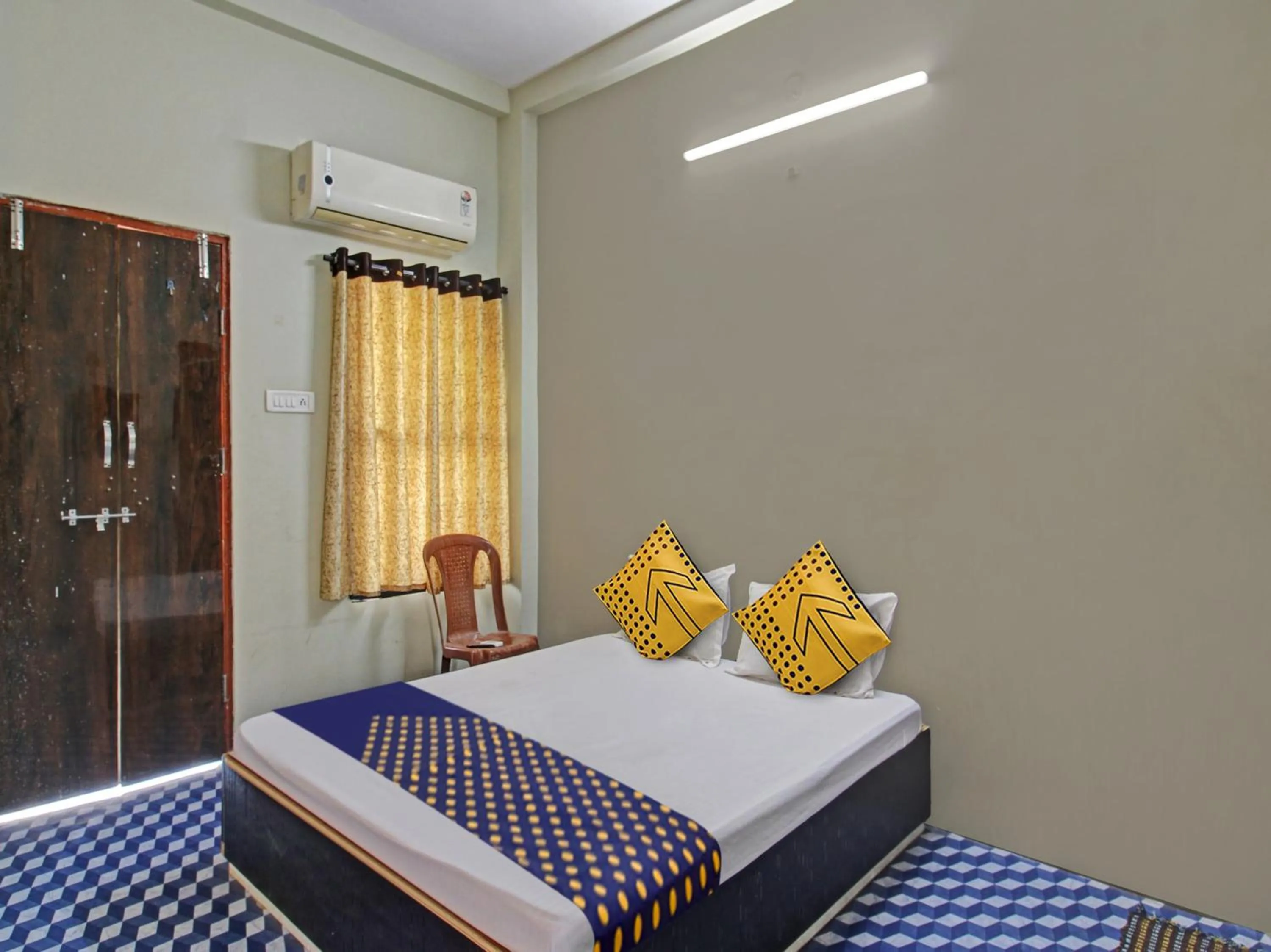 Bedroom in Hotel O G.K Lodging and Guest House