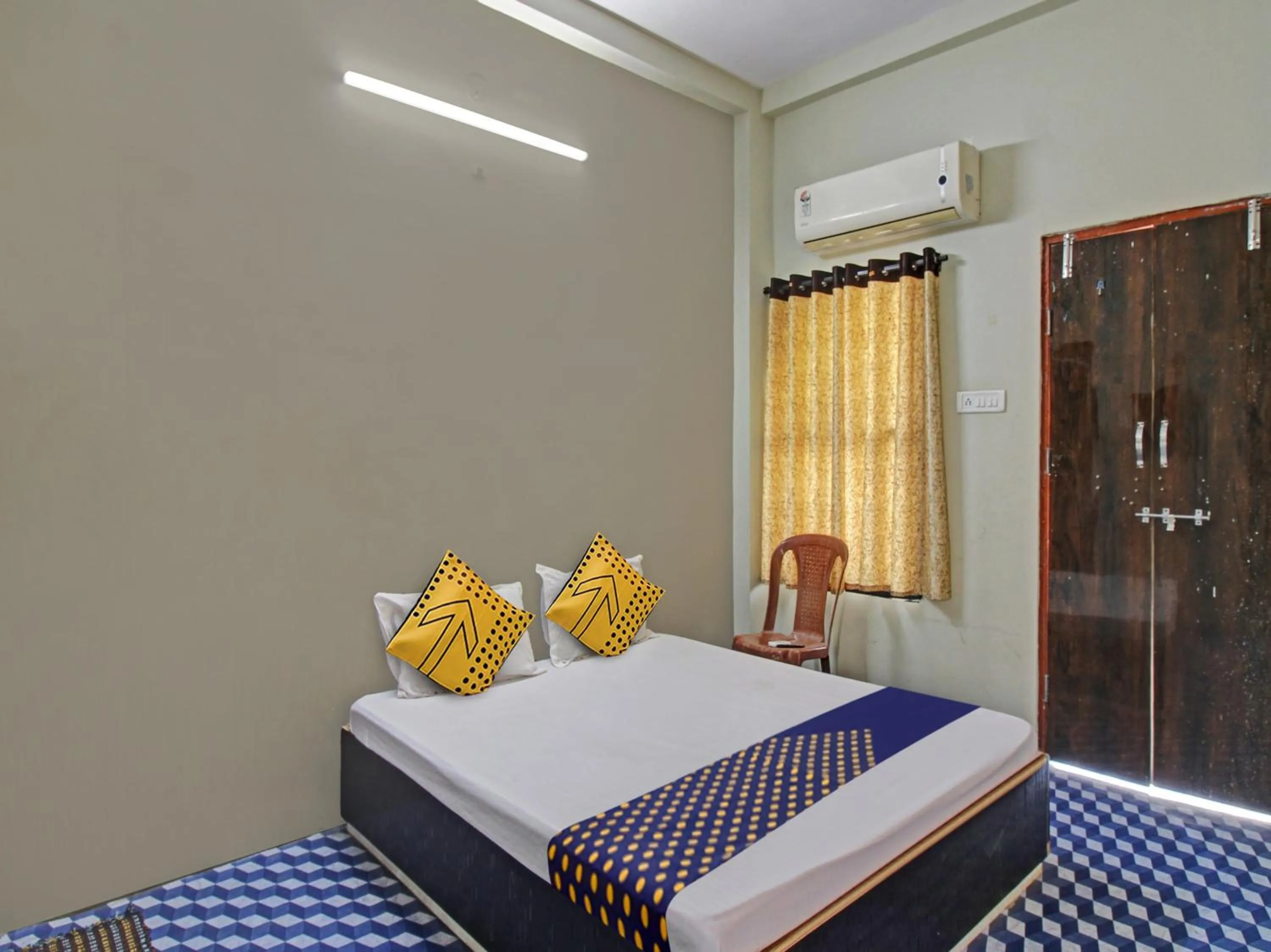 Bedroom in Hotel O G.K Lodging and Guest House