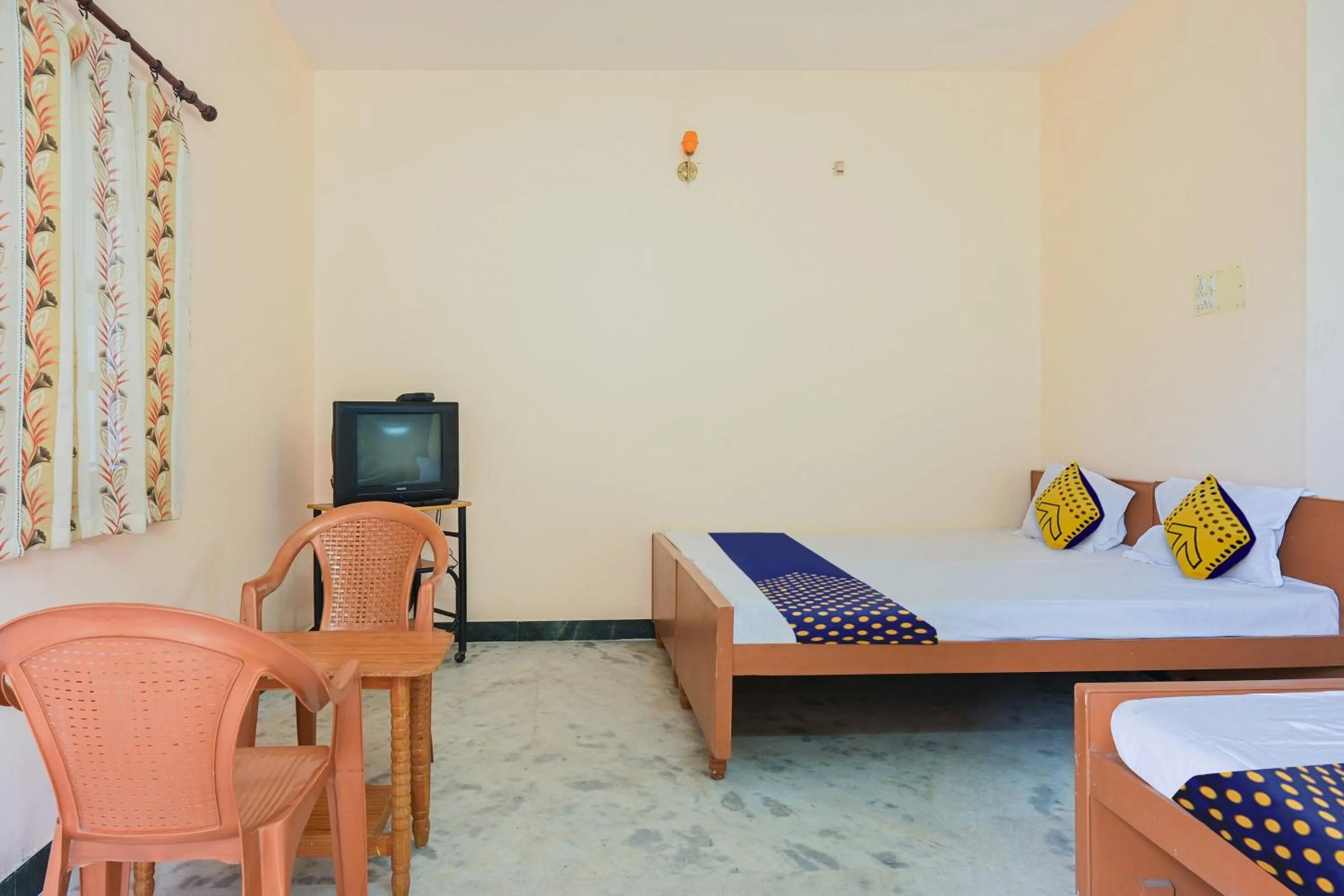 Bedroom in Hotel O Vel Vel Guest House