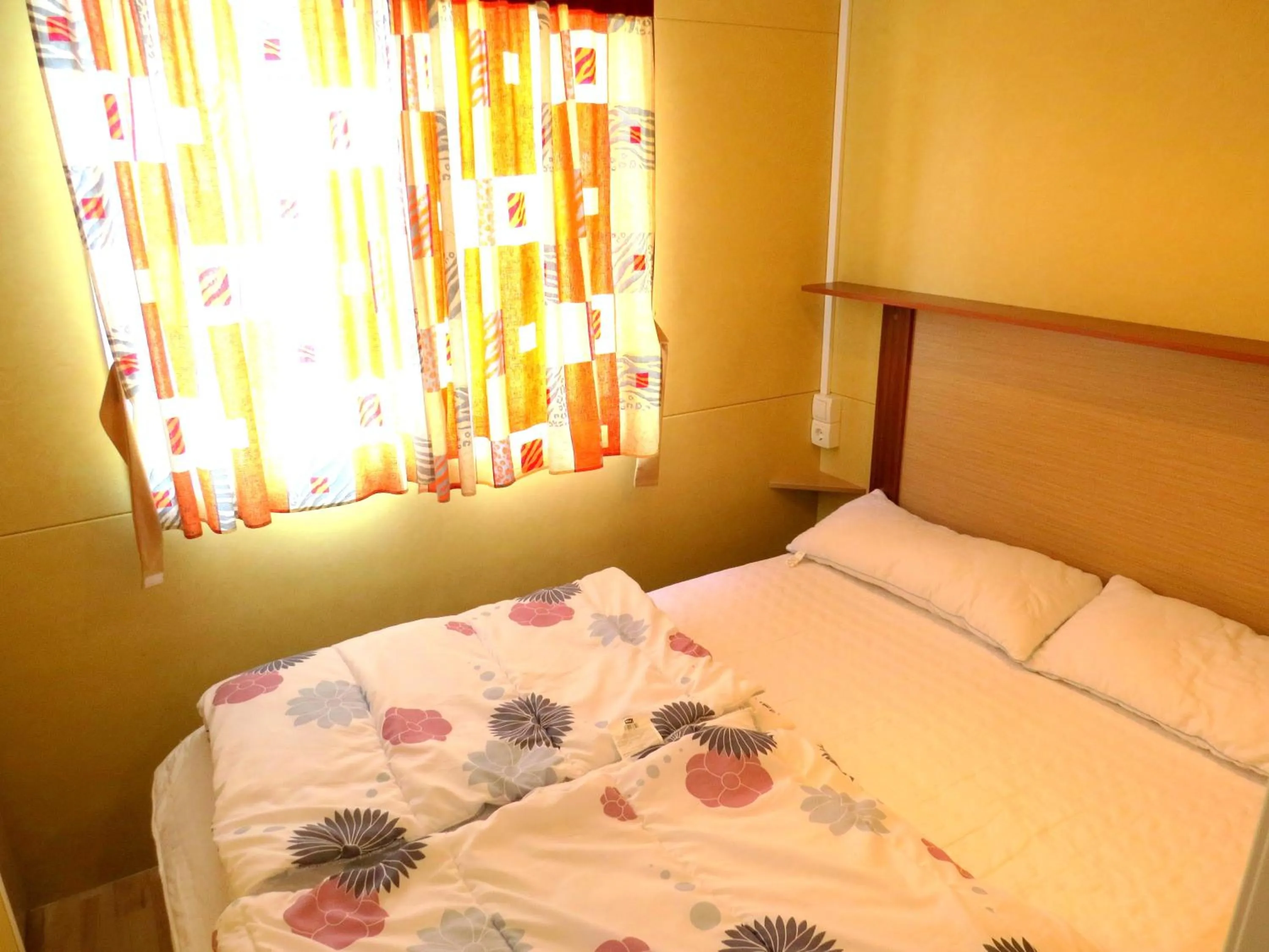 Bedroom in Camping Media Mobile Homes in Brioni Sunny Camping