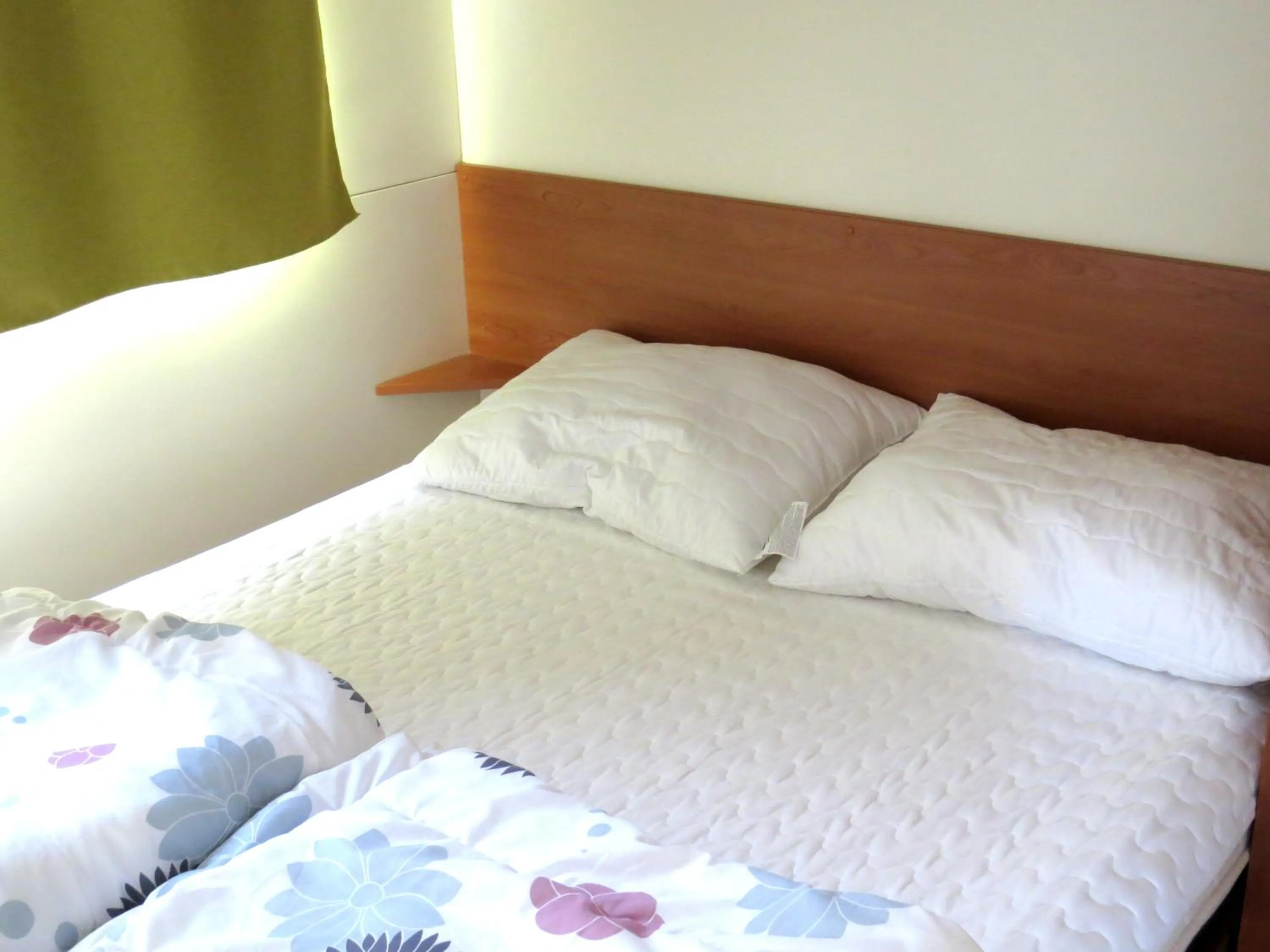 Bedroom in Camping Media Mobile Homes in Brioni Sunny Camping