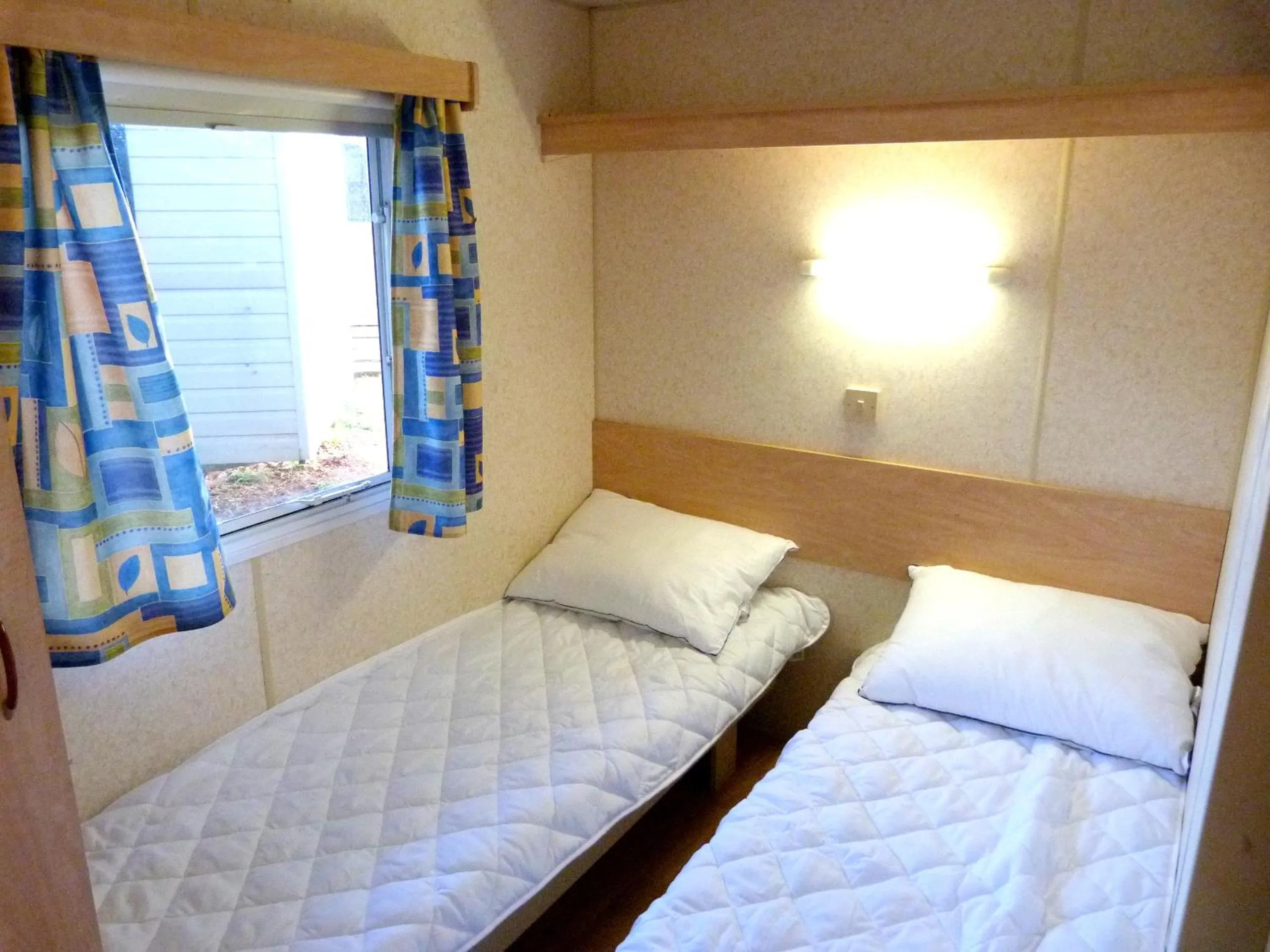 Bedroom in Camping Media Mobile Homes in Brioni Sunny Camping