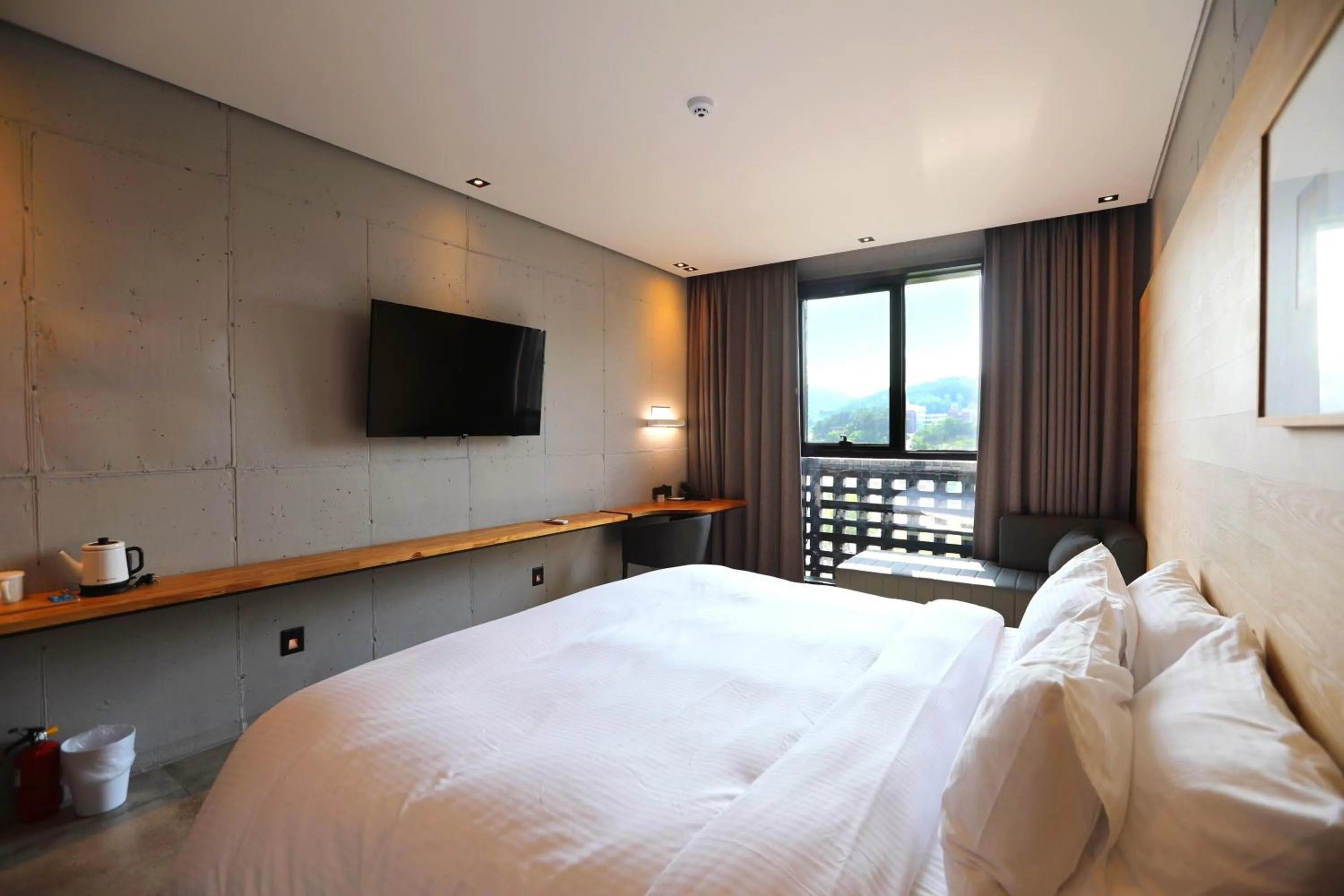 Bed in The Hong C Hotel