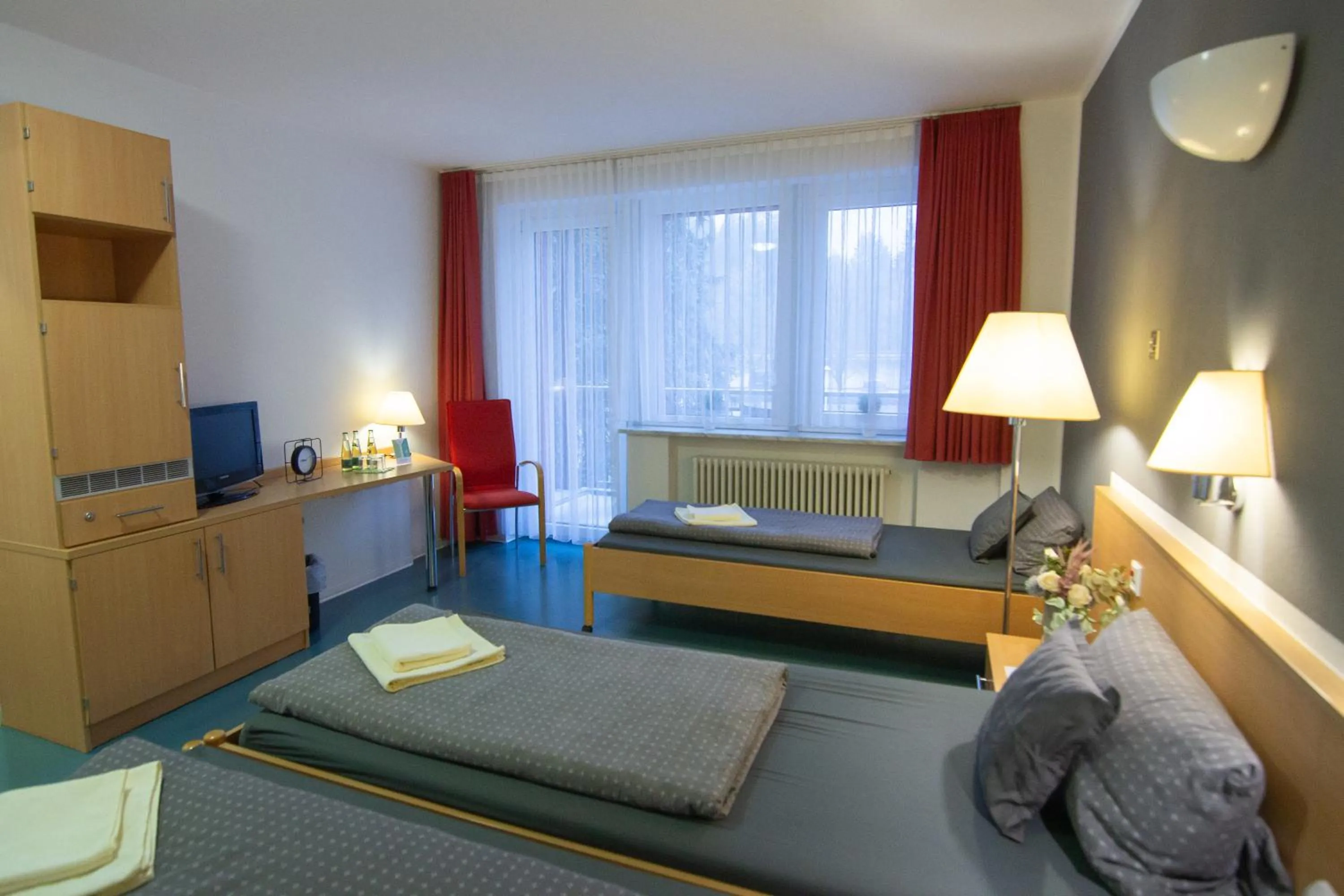 Bed in Green Night Hotel