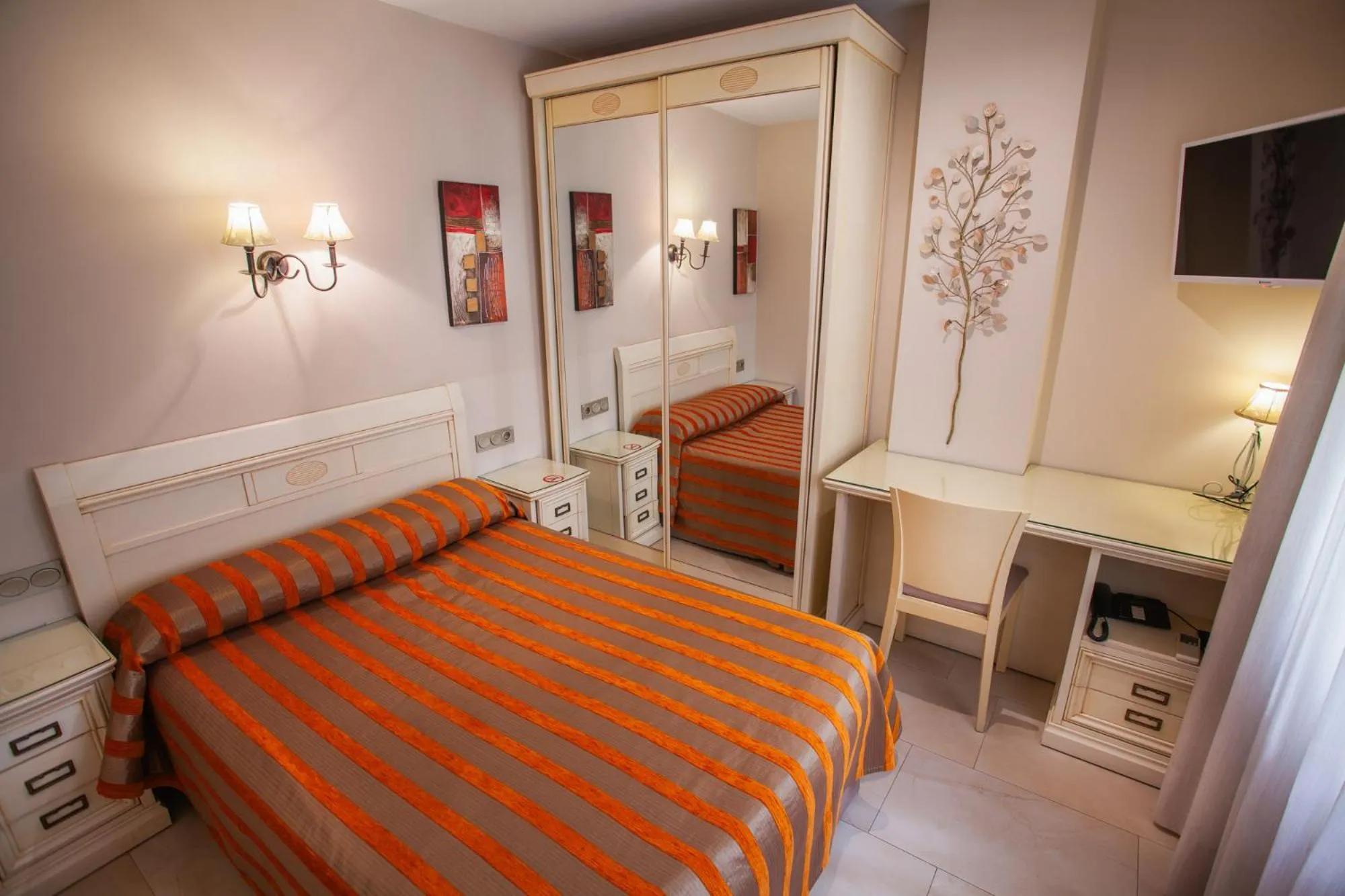 Bed in Hotel Versalles