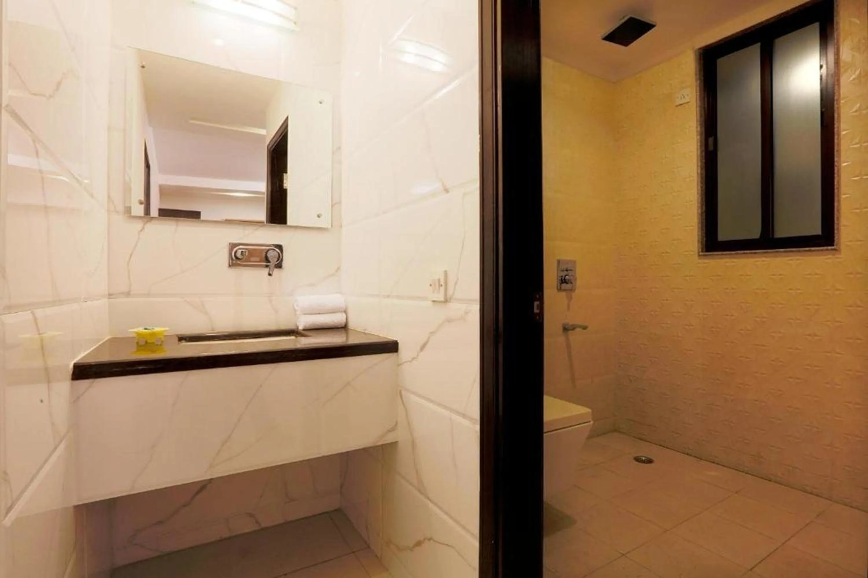 Bathroom in Arch Anand Lok Inn Mahipalpur, IGI Delhi Airport