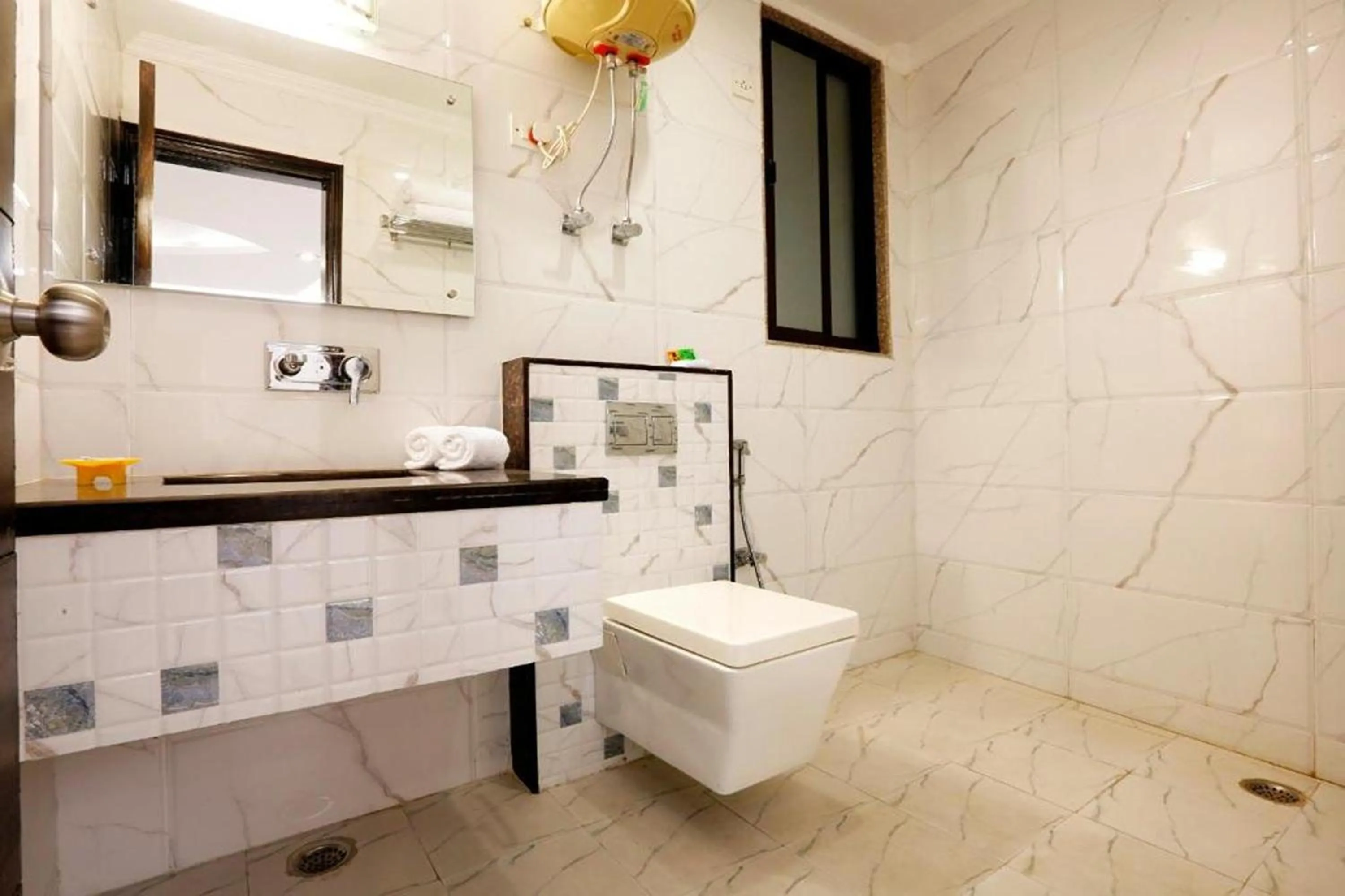 Bathroom in Arch Anand Lok Inn Mahipalpur, IGI Delhi Airport