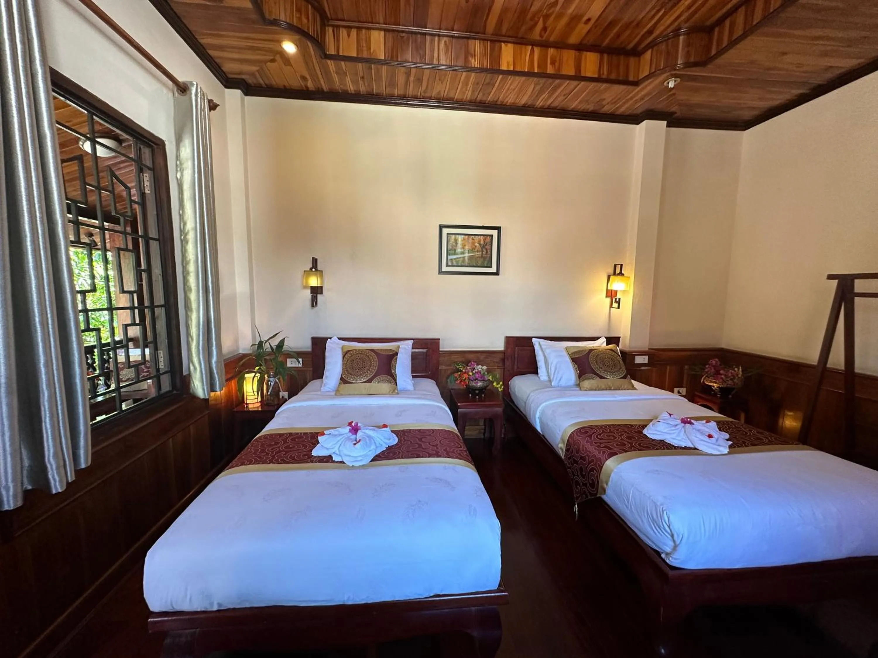 Bed in Ammata Boutique Villa
