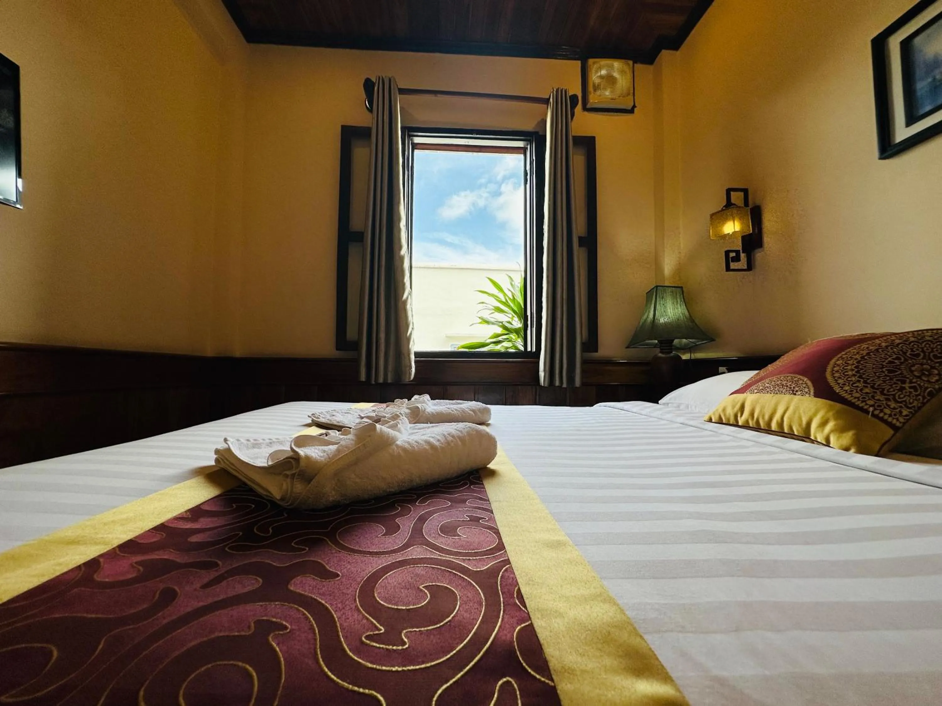 Bed in Ammata Boutique Villa