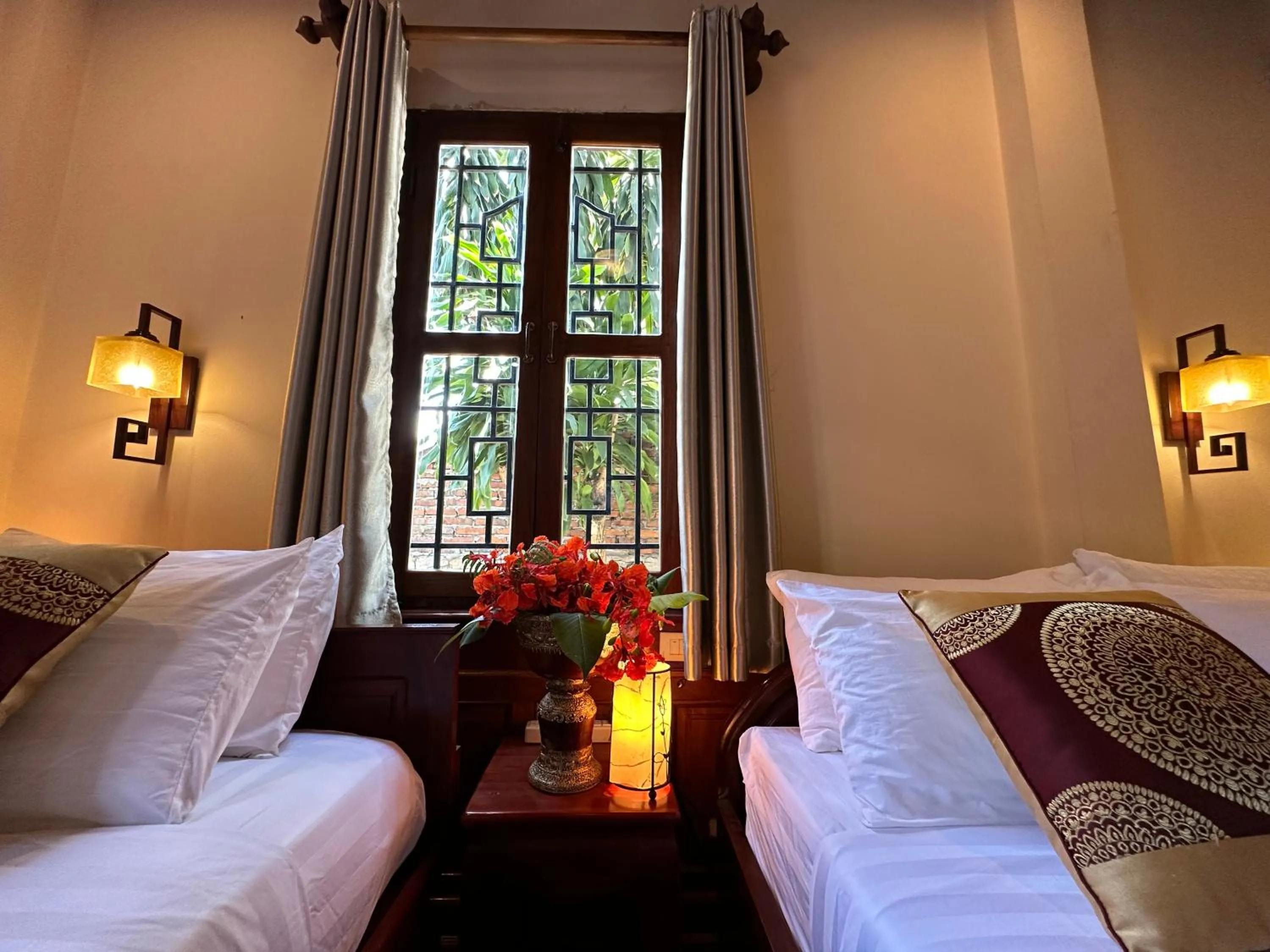 Bed in Ammata Boutique Villa