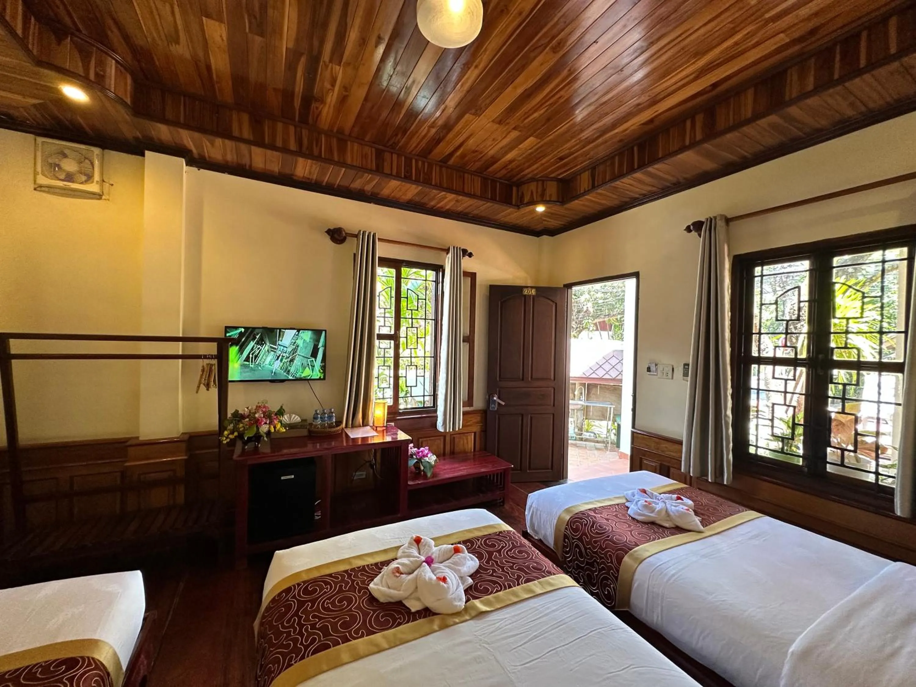Bed in Ammata Boutique Villa
