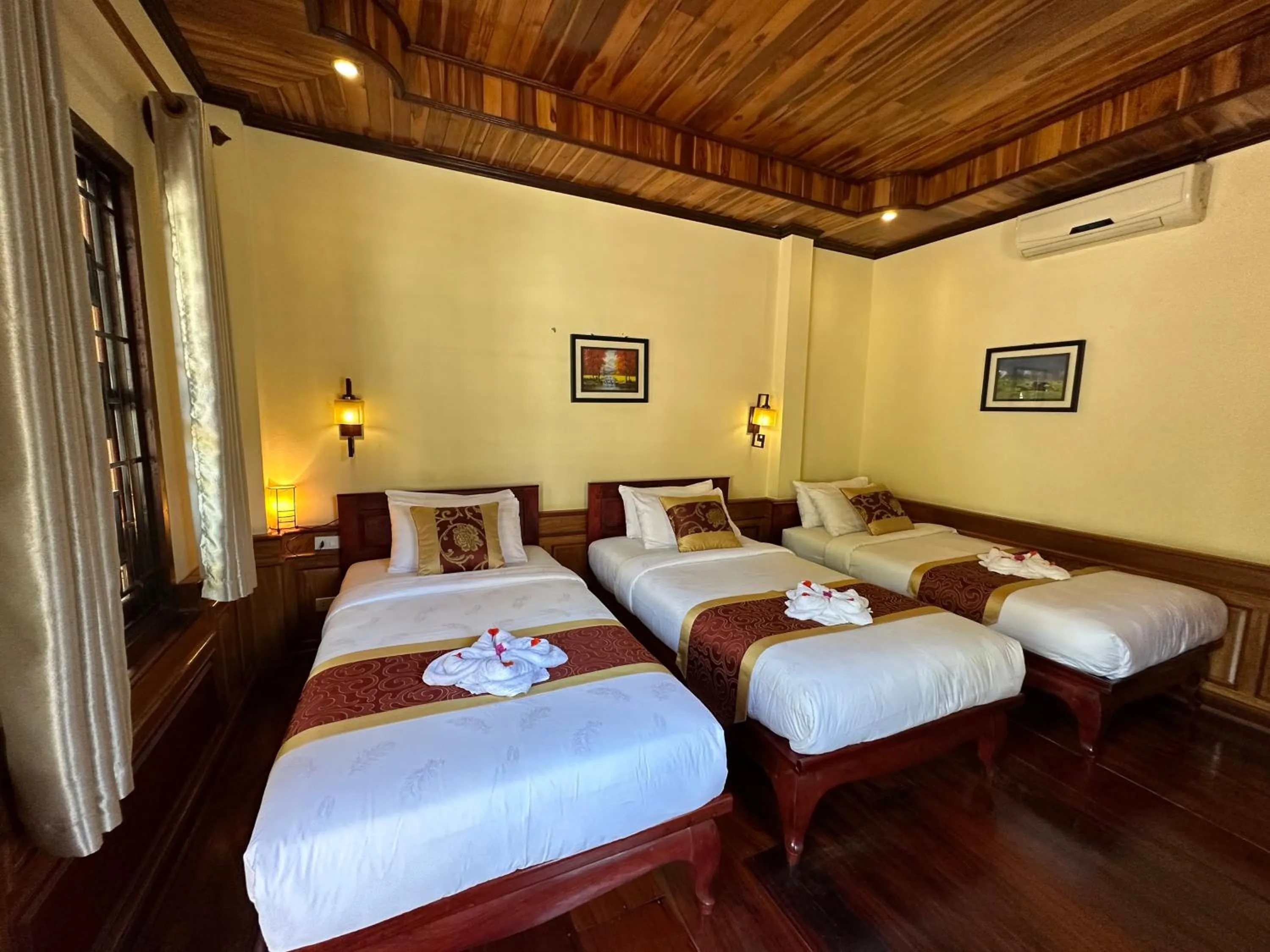 Bed in Ammata Boutique Villa