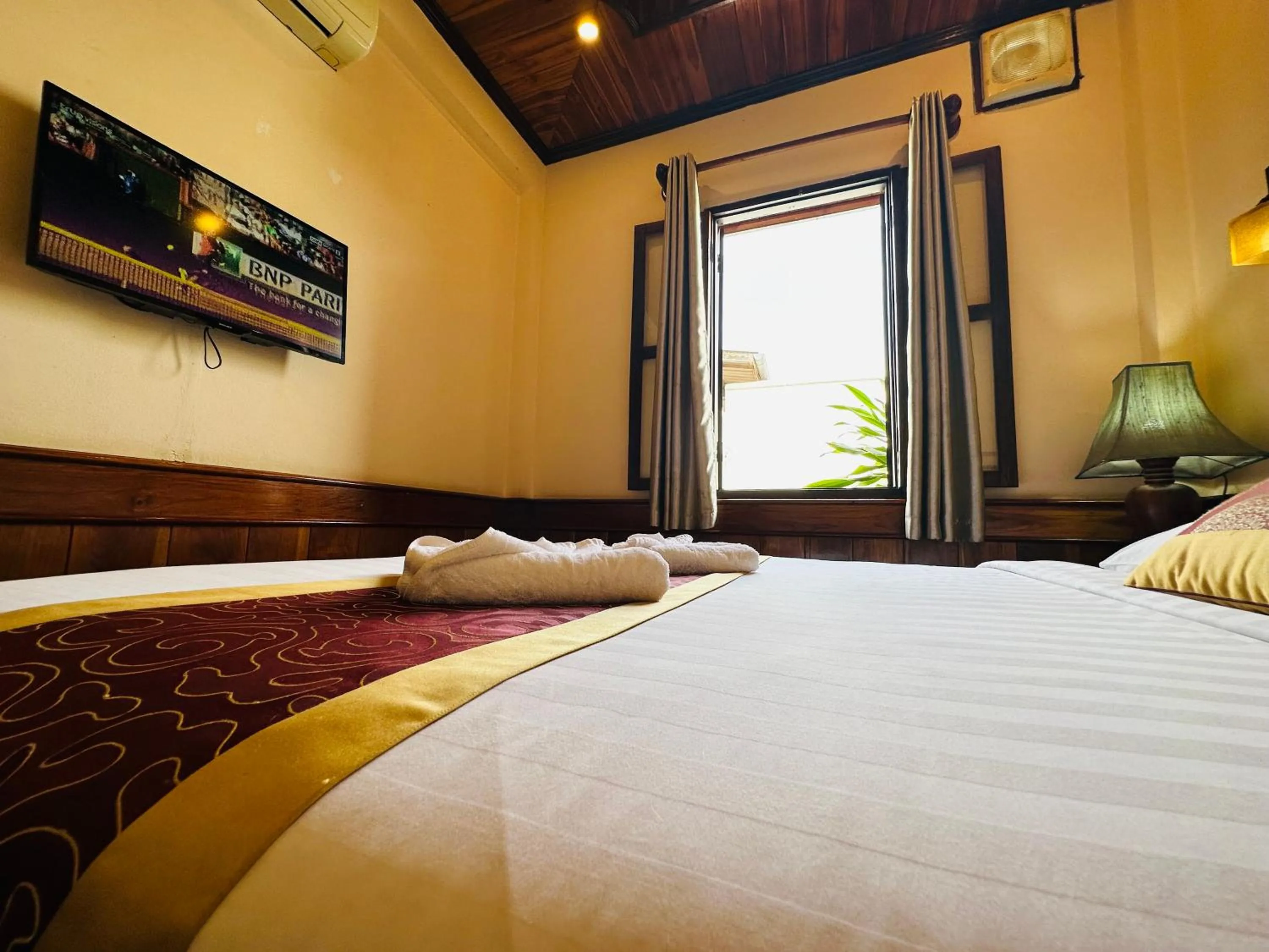 Bed in Ammata Boutique Villa