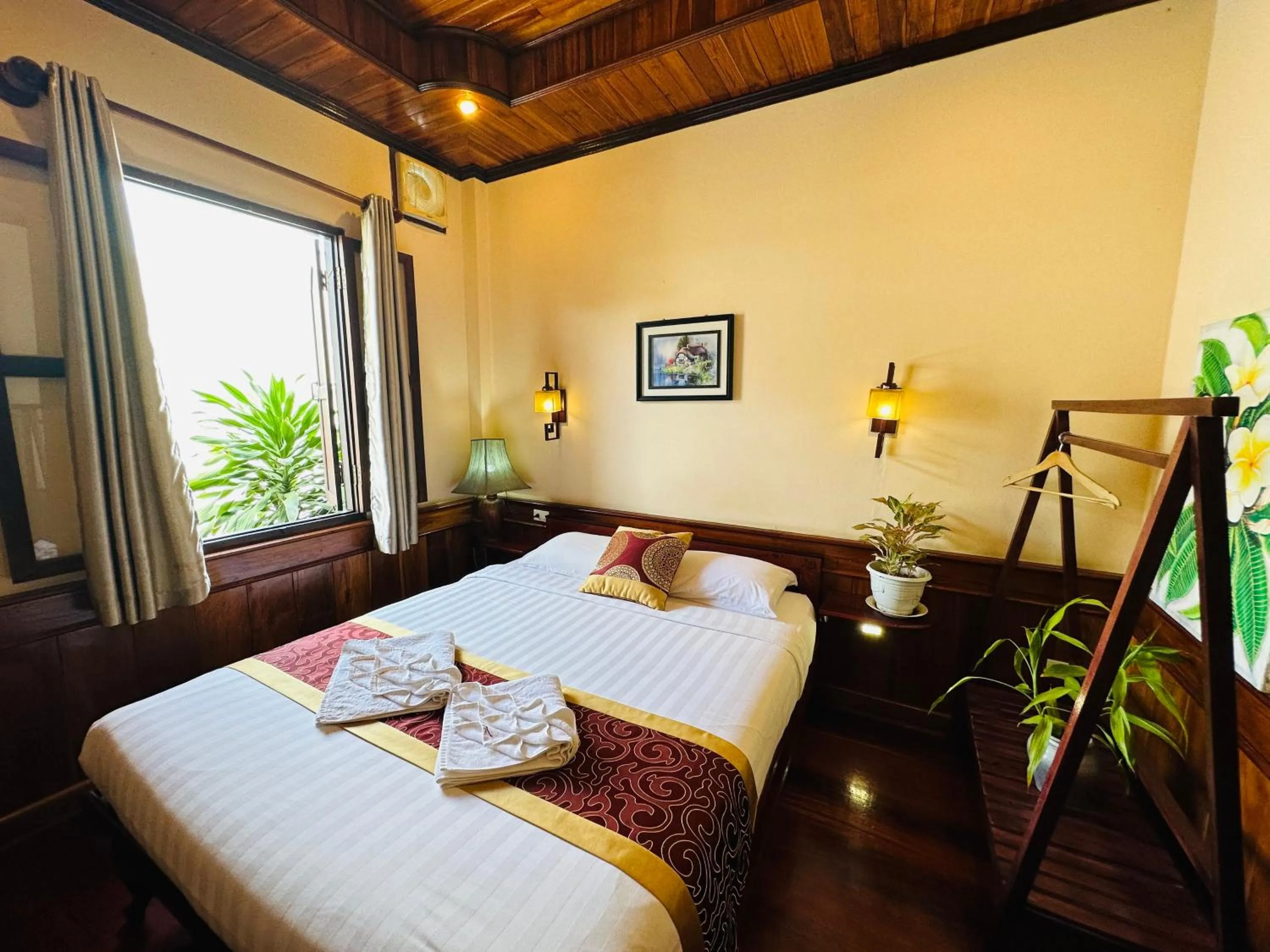 Bed in Ammata Boutique Villa
