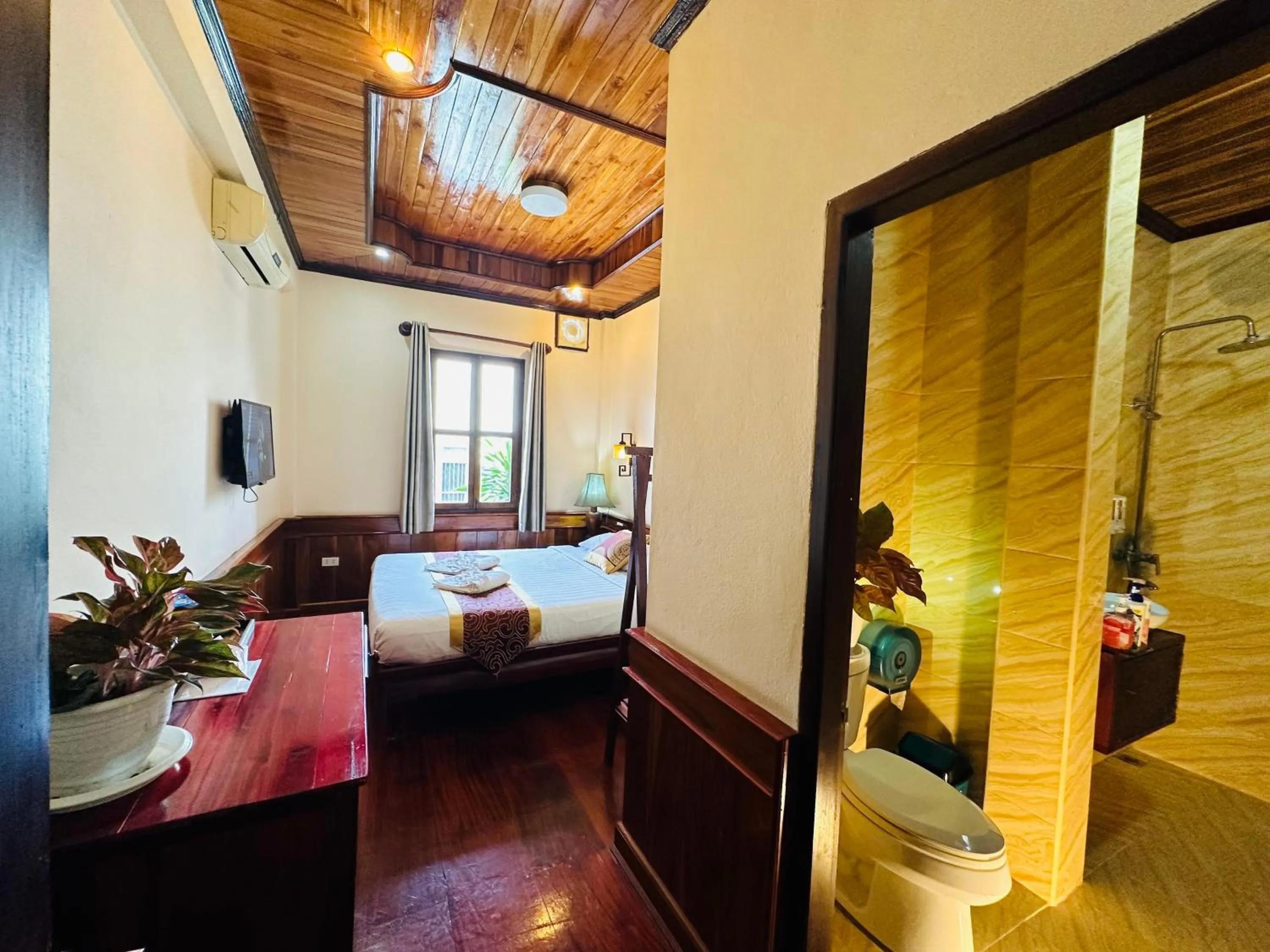 Bed in Ammata Boutique Villa